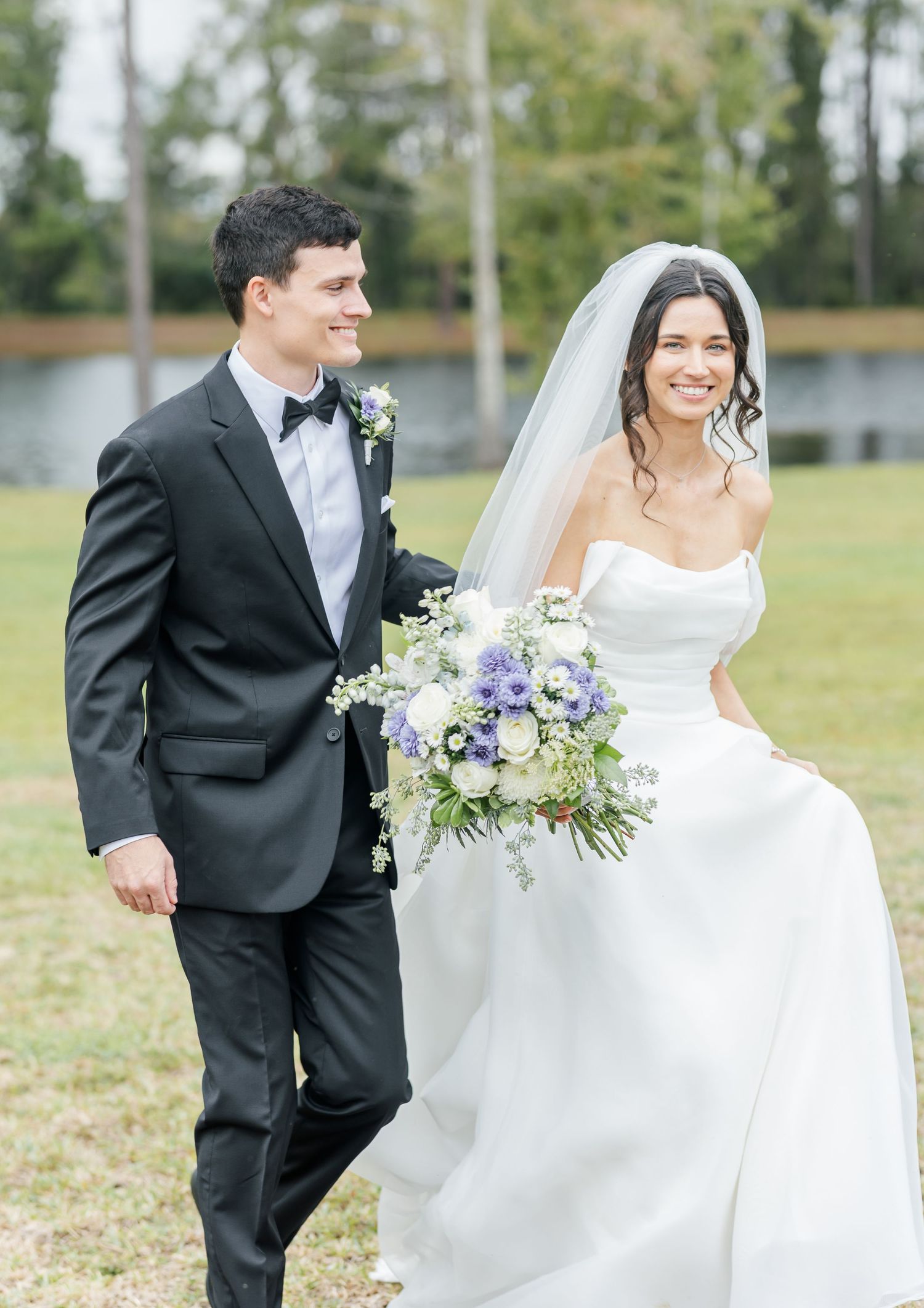 Candid wedding photos of couple walking and laughing together outdoors.