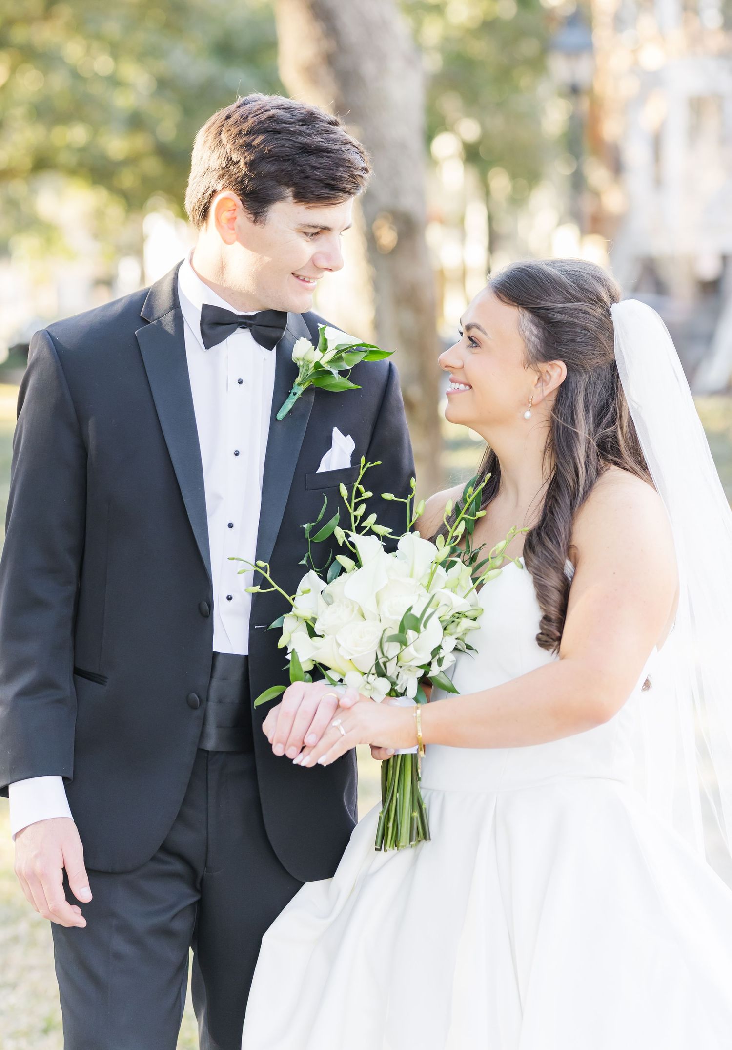 Candid wedding photos showing couple in formal attire sharing joyful moments outdoors.