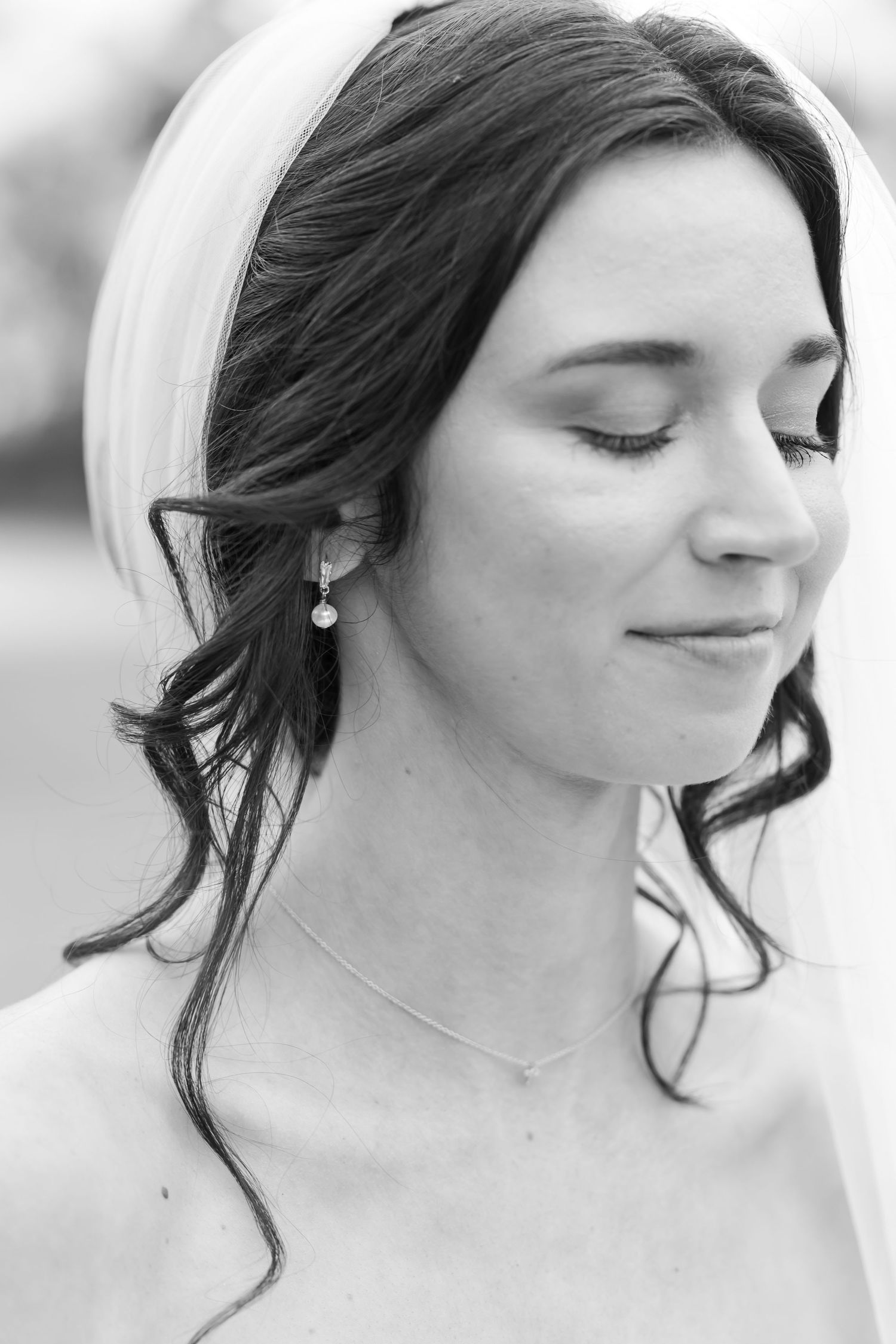 Black and white portrait series showing a person with dark hair and closed eyes in multiple dreamy poses.