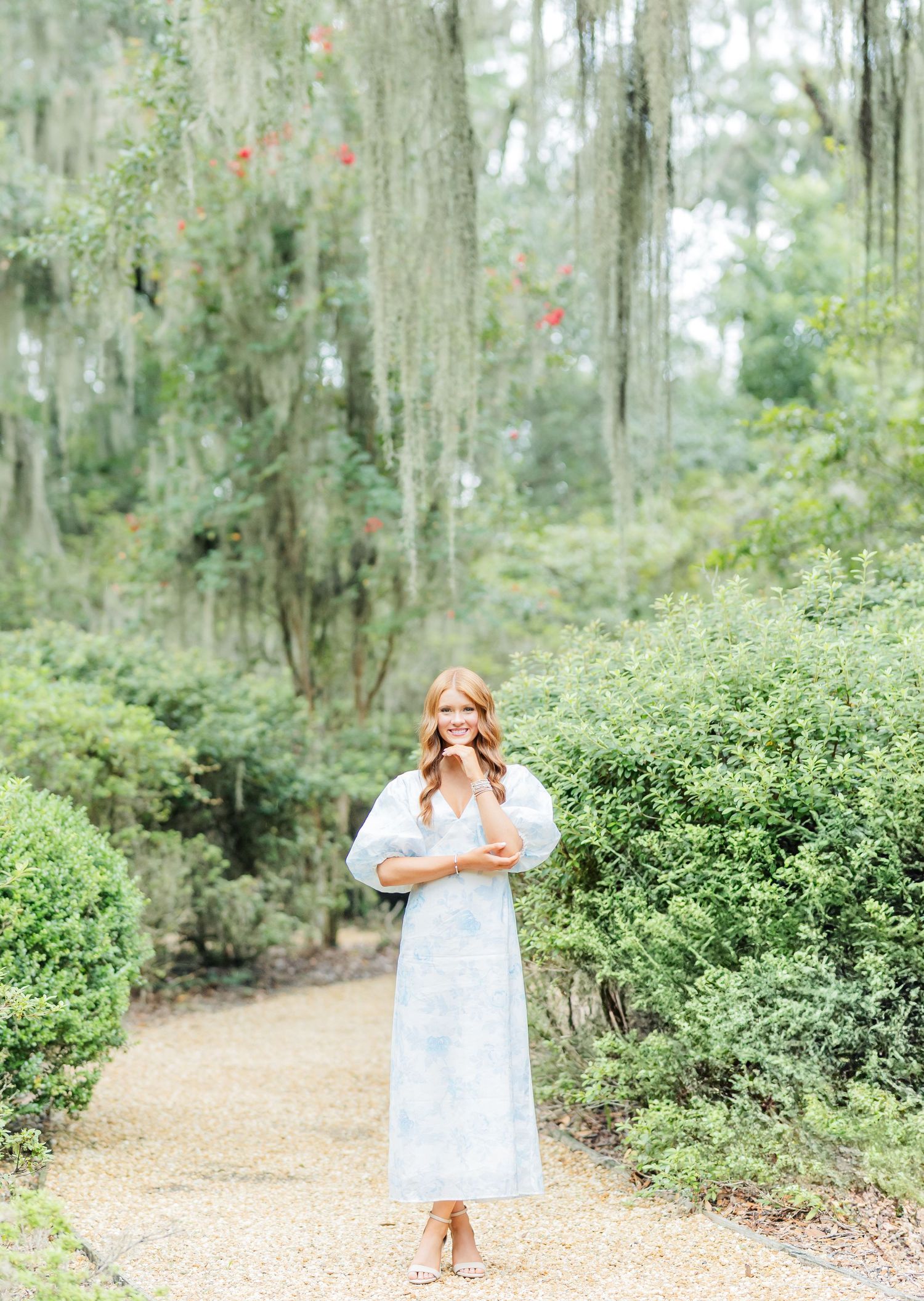 A sequence of photos showing a person in a white dress walking through a misty forest path lined with Spanish moss.