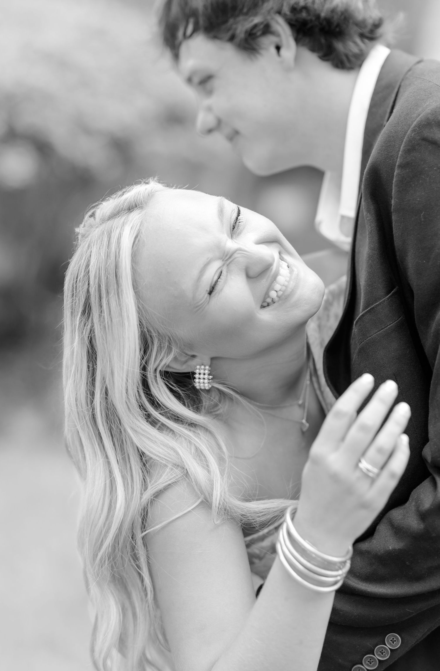 Black and white artistic photo sequence capturing tender romantic moments.