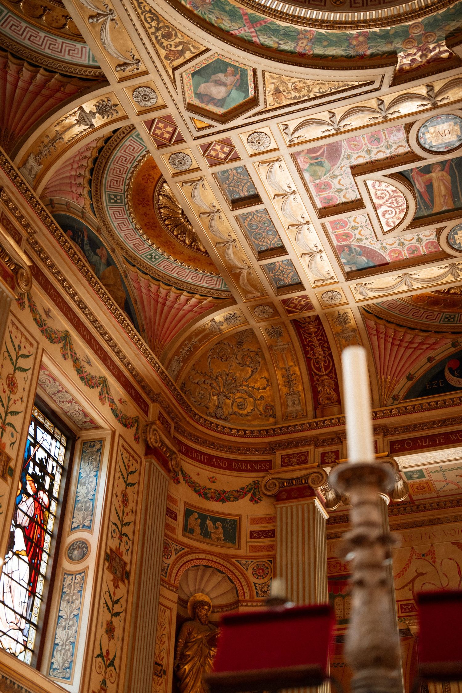 Ornate baroque ceiling with gilded details, painted murals and decorative moldings in a historic theater or palace interior. Oxford wedding