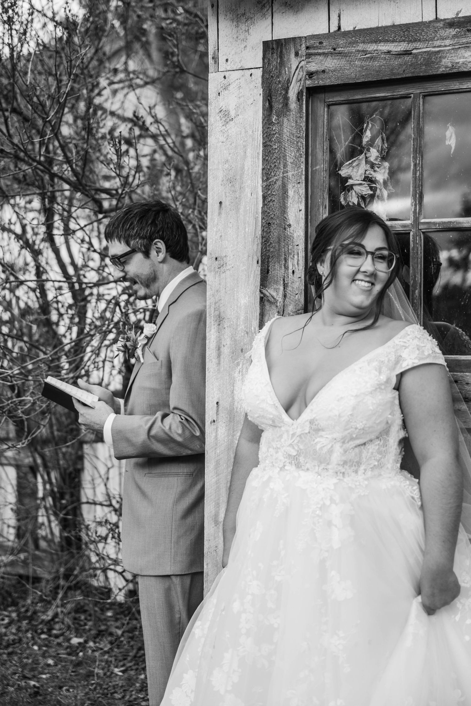 A series of candid wedding photos showing joyful moments between a couple in formal attire outside a rustic building.
