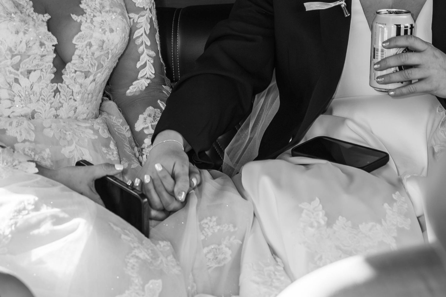 A collection of black and white wedding photos showing candid moments during a celebration.