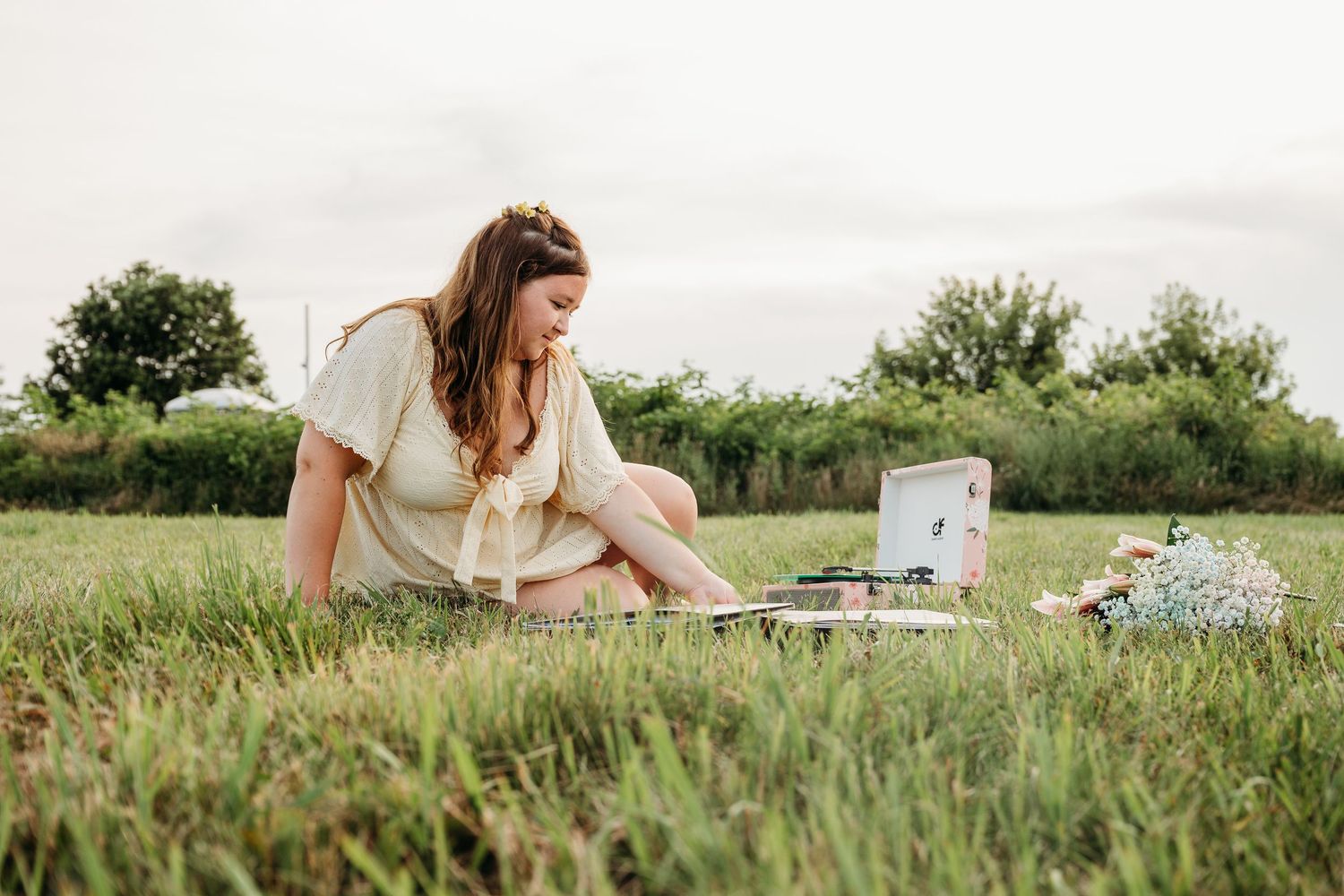 A collection of lifestyle photography shots showing serene outdoor moments in a green field on a summer day.