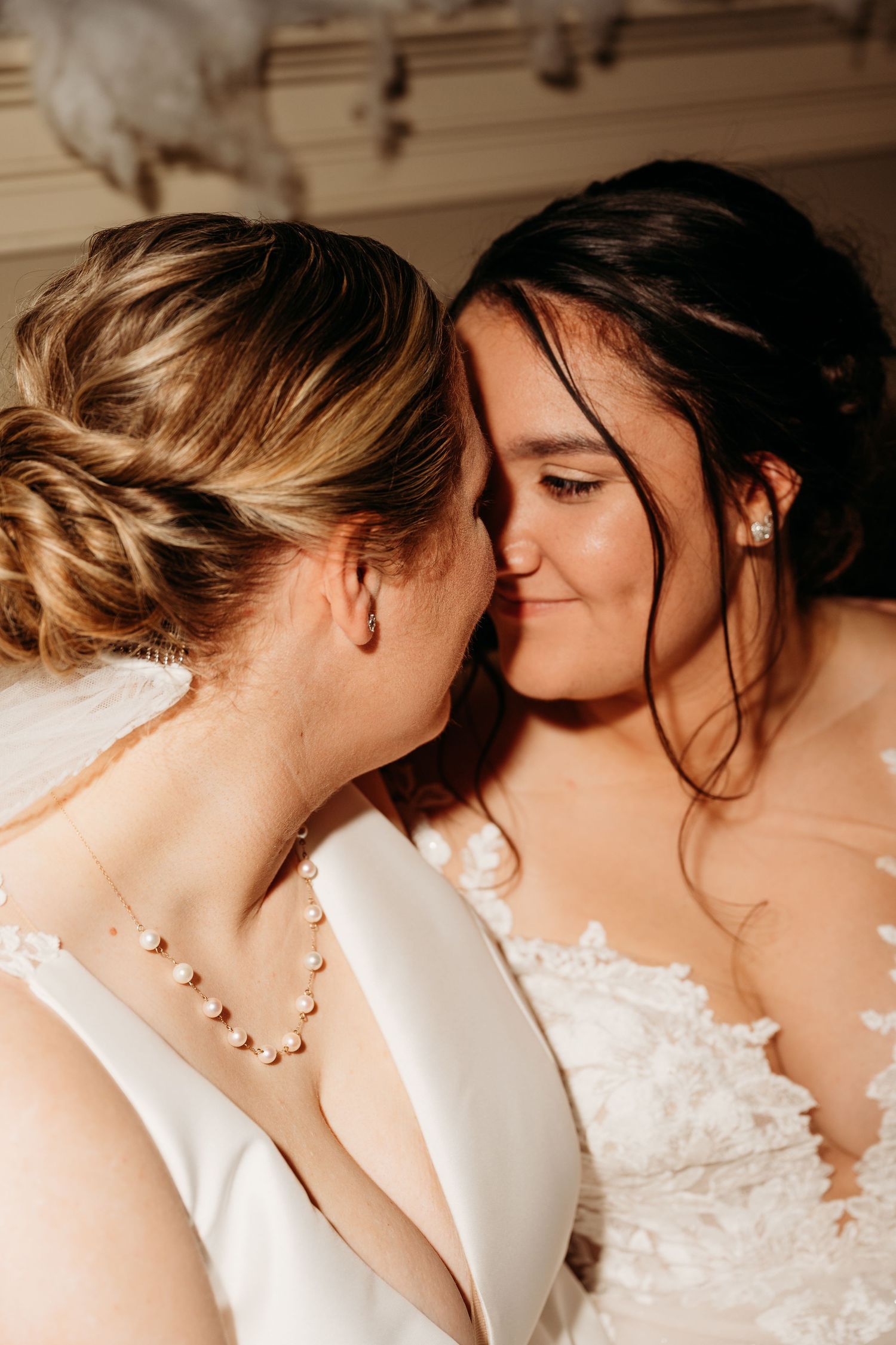 A romantic sequence of intimate moments between a couple in wedding attire, shown in soft sepia tones.