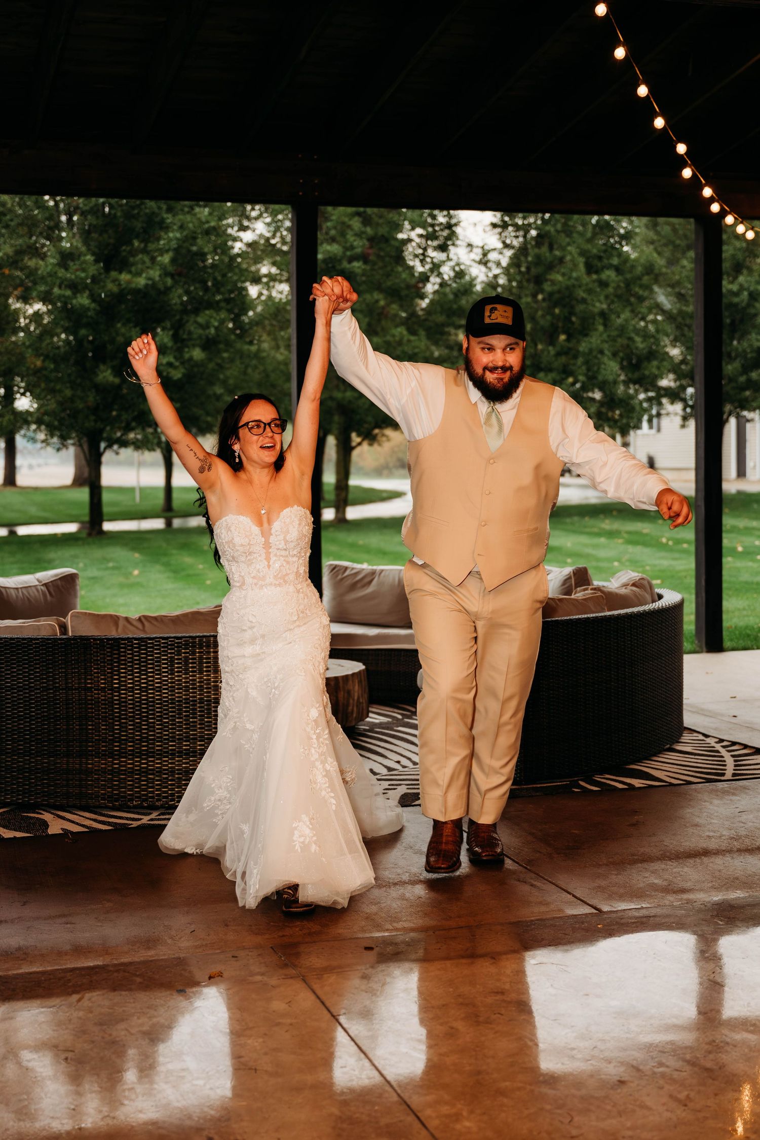A sequence of joyful dance moments on a covered patio with string lights overhead.