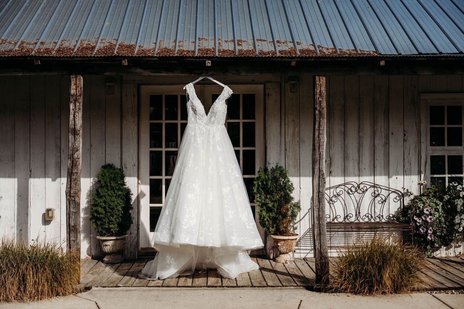 A collection of wedding dress photos displayed in sequence against rustic wooden backgrounds and porches.