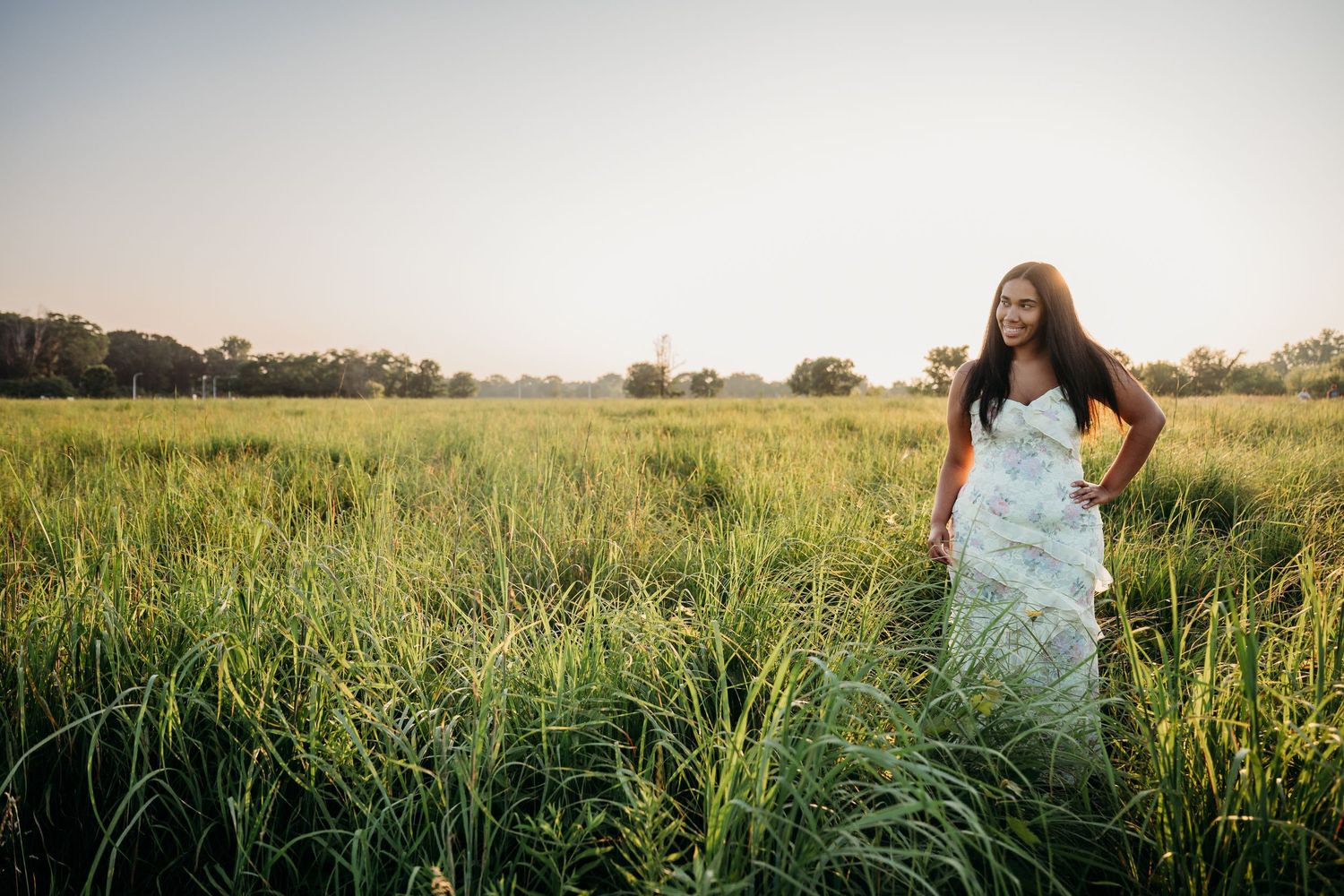 Row of portrait shots framed against tall grass and fields during golden hour lighting.