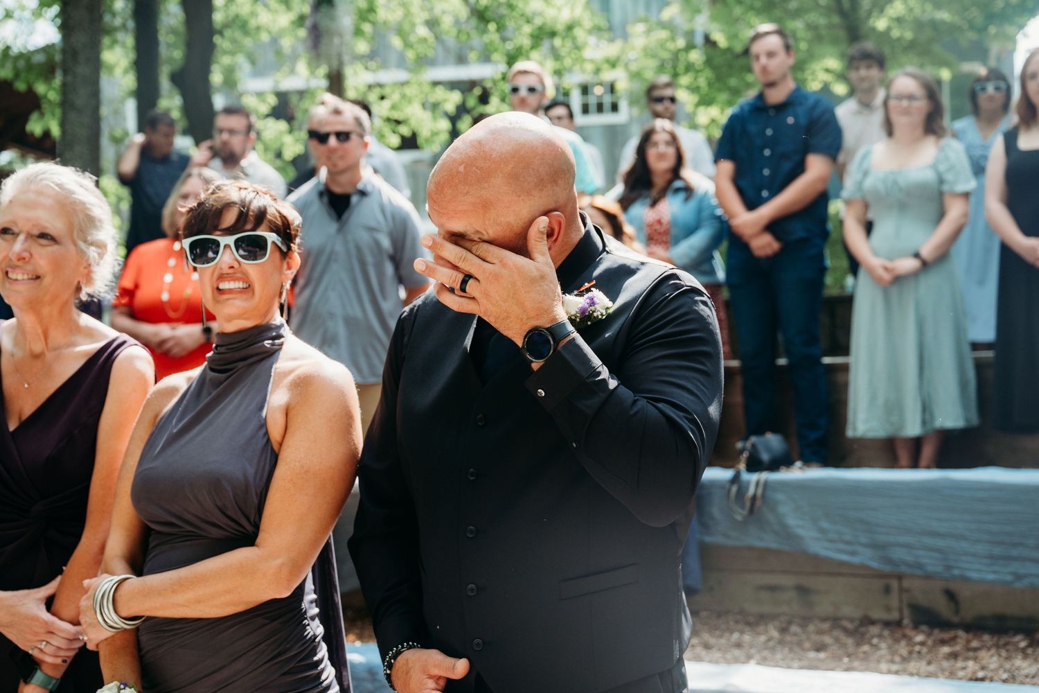Collage of tender dancing moments at an outdoor wedding reception in a lush garden setting.