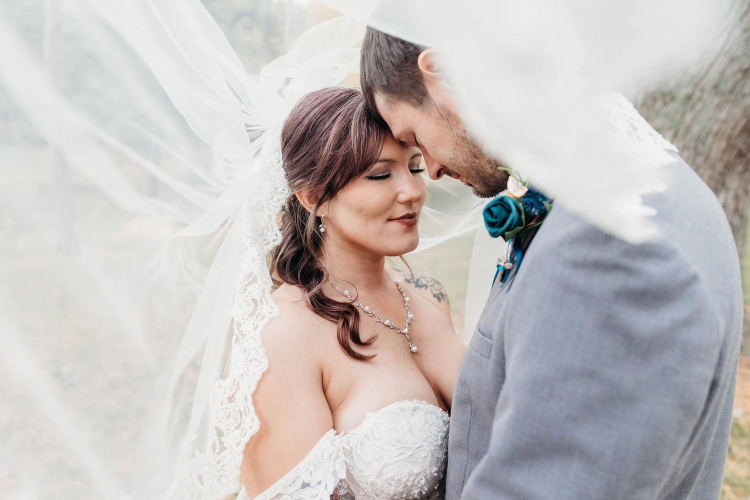 Romantic wedding couple shares intimate moments in a series of close-up shots with soft lighting and white veil details.