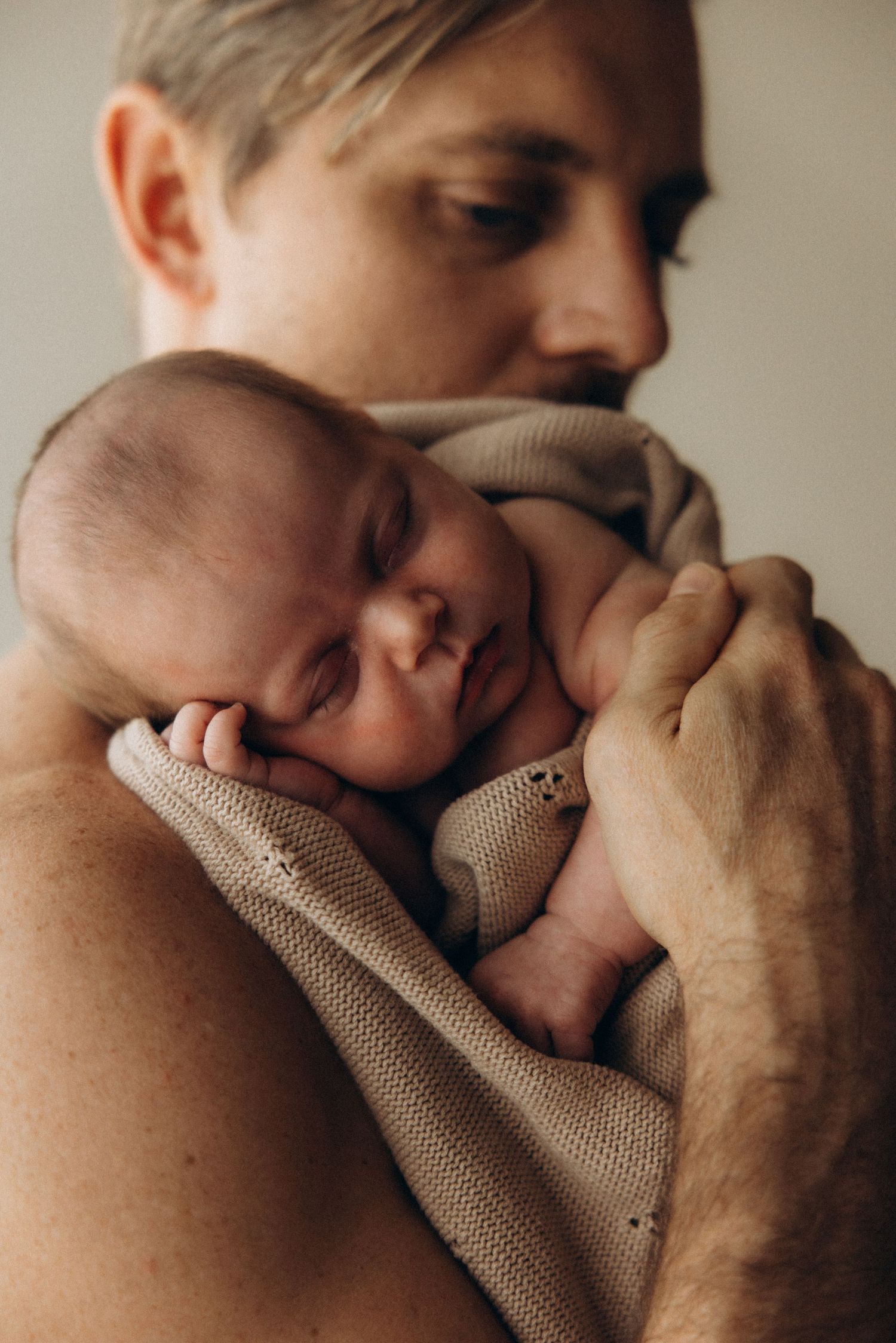 A sequence of tender moments captured in warm tones showing closeness and comfort.