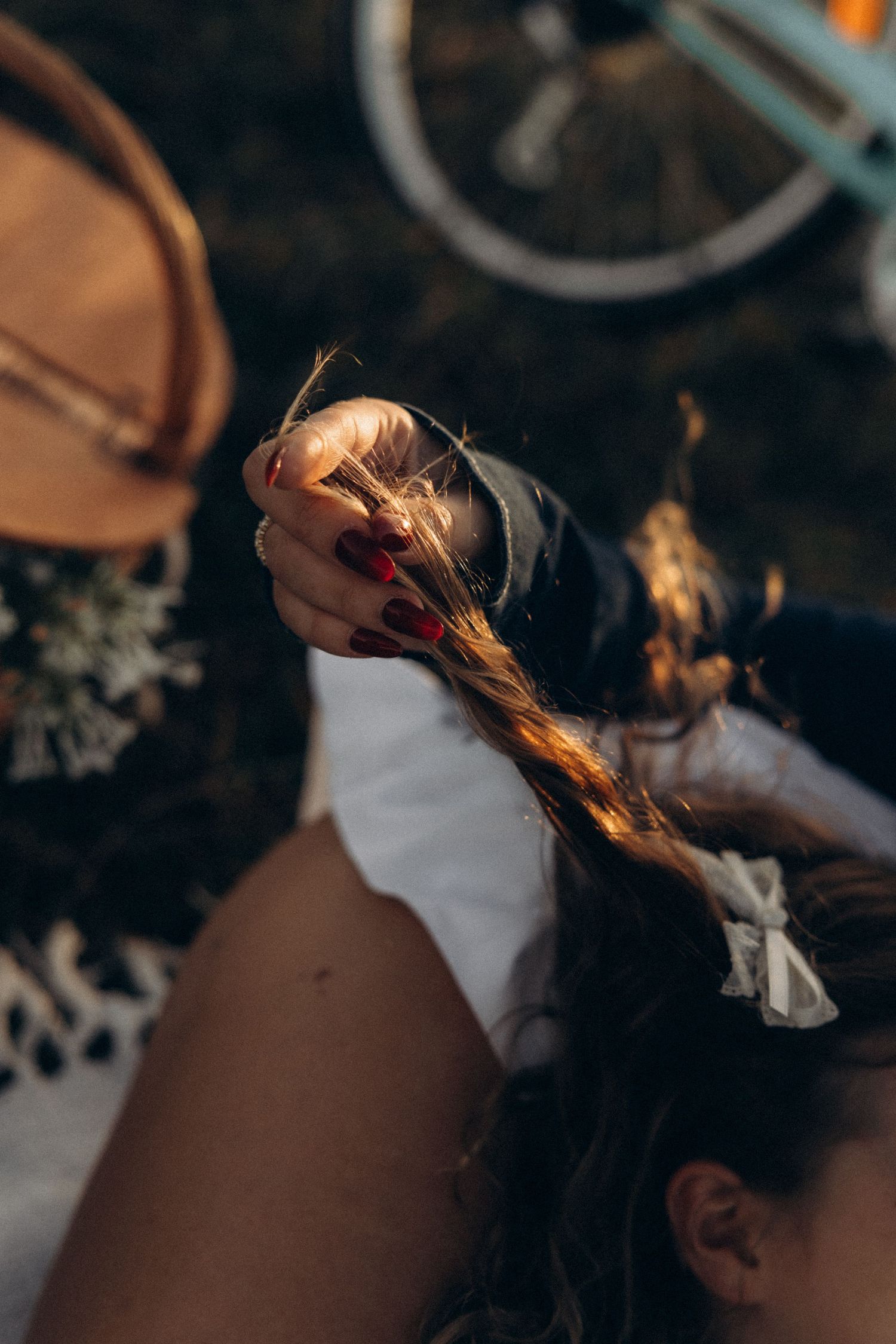 Intimate close-up shot of a couple during a sunset picnic outdoors.