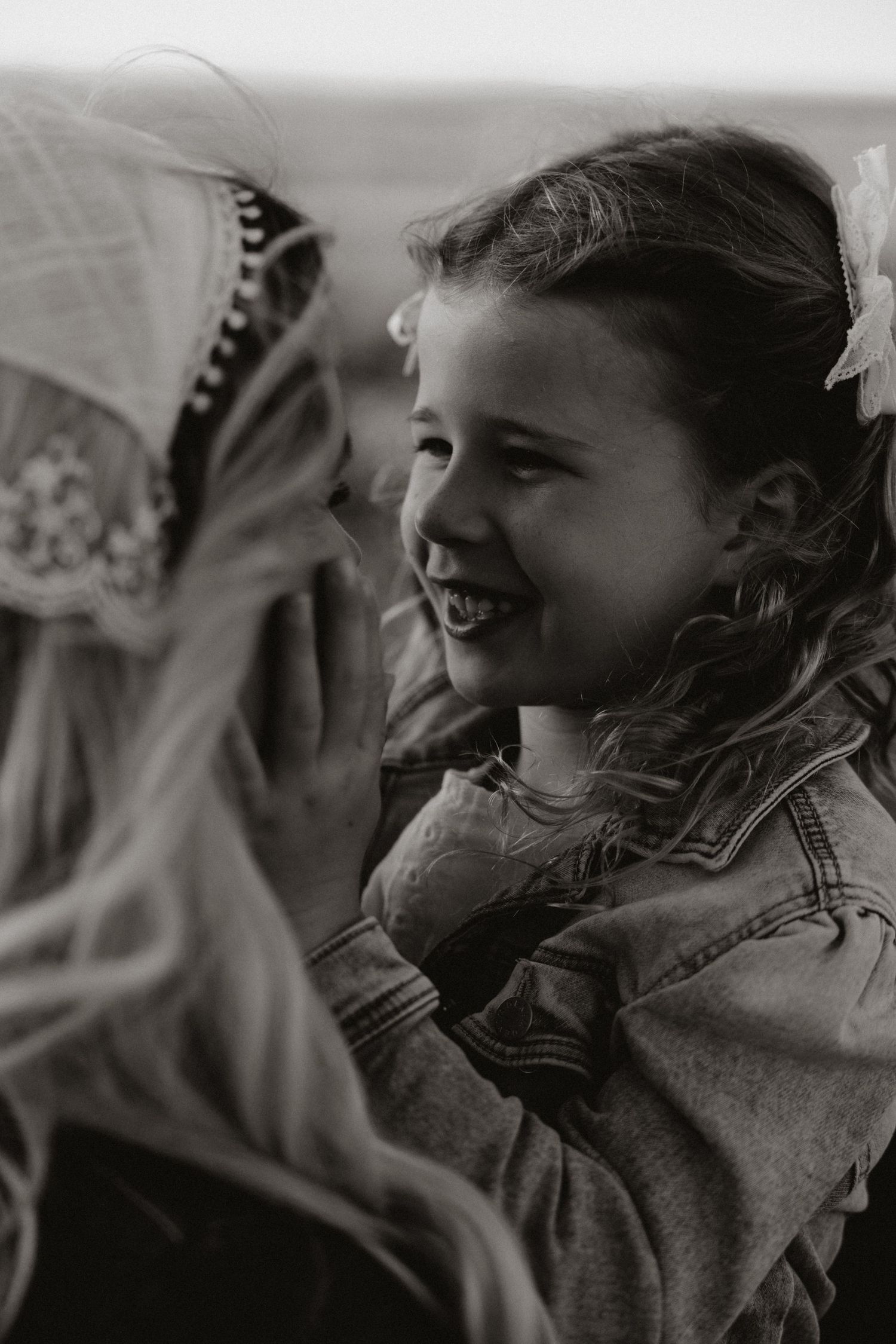 Black and white portrait capturing joyful expressions and laughter.