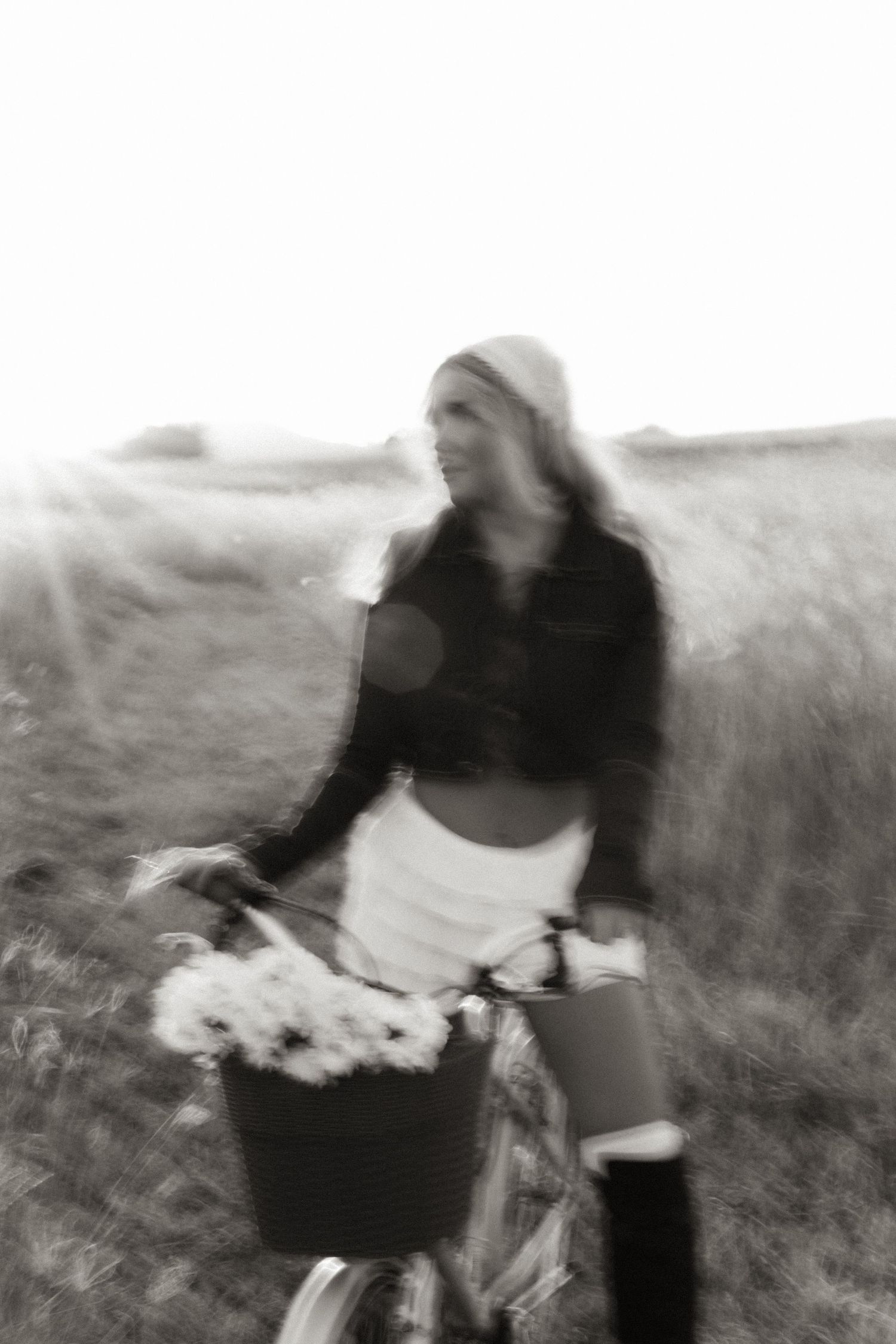 Blurred motion shot of people in a field with artistic effect.