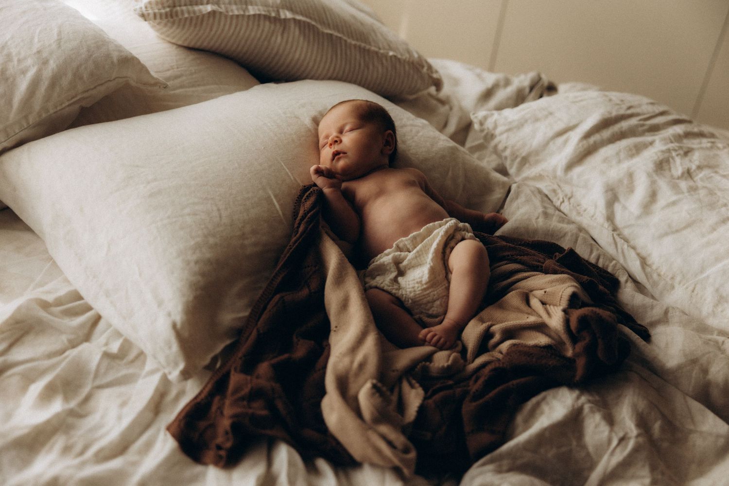 A series of photographs showing peaceful moments in bed with soft natural lighting.