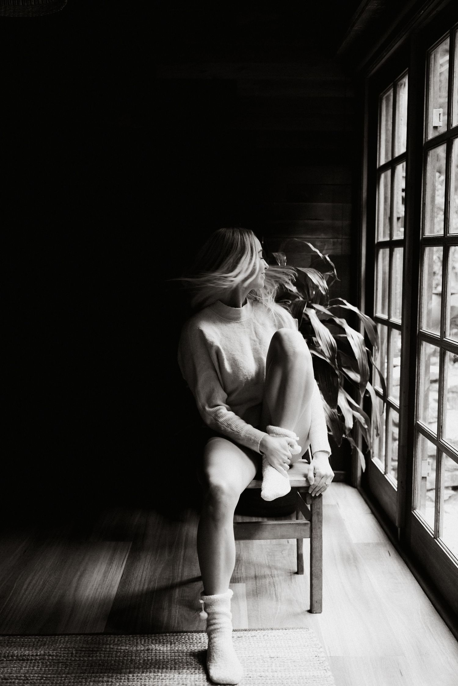 Dynamic motion blur sequence captured in black and white by window light.