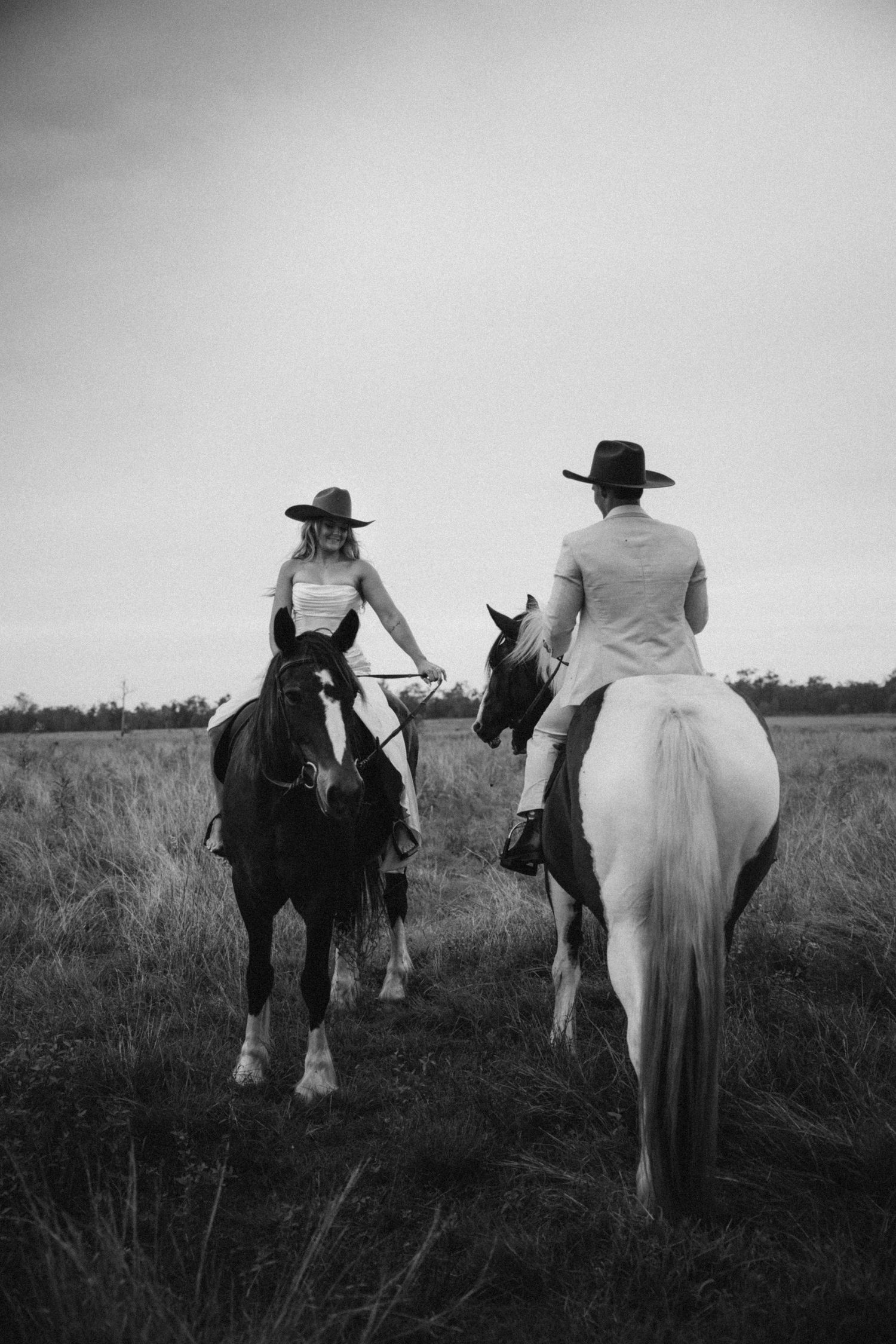 Black and white photo sequence of people riding horses through a field.