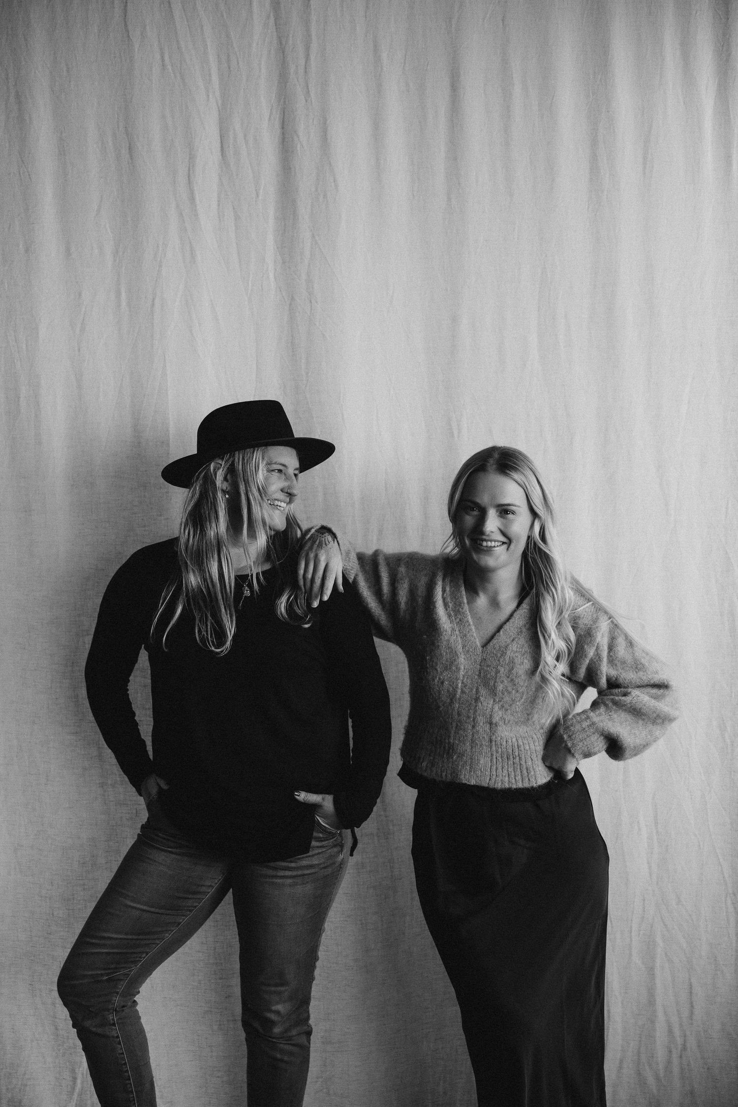 Playful photo sequence against white backdrop showing friends posing and laughing together.