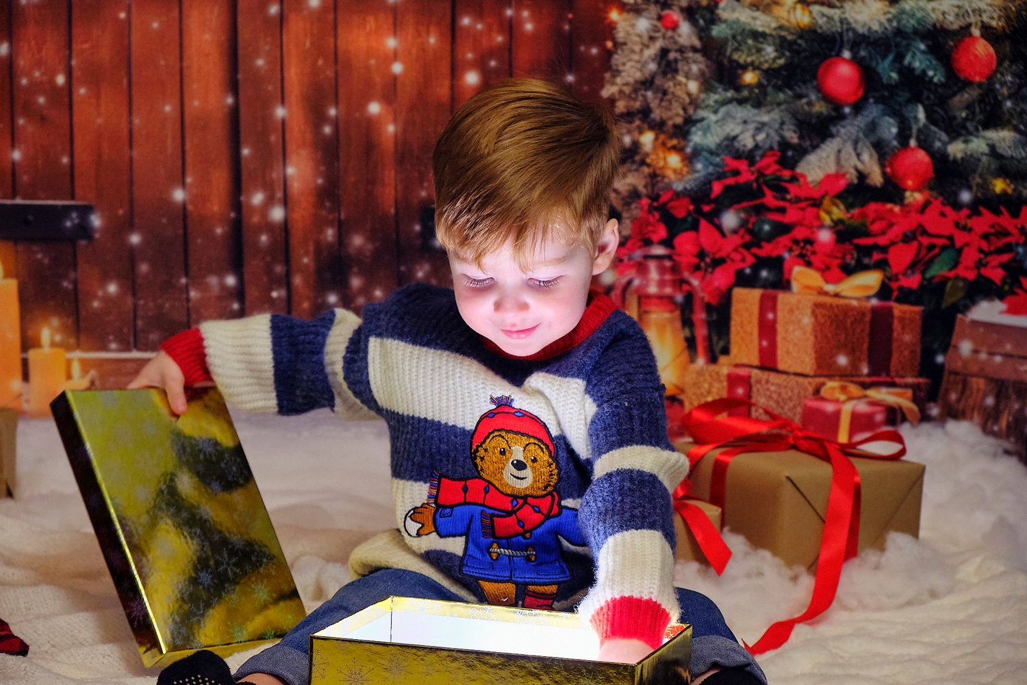 Child smiling, Christmas themed background.