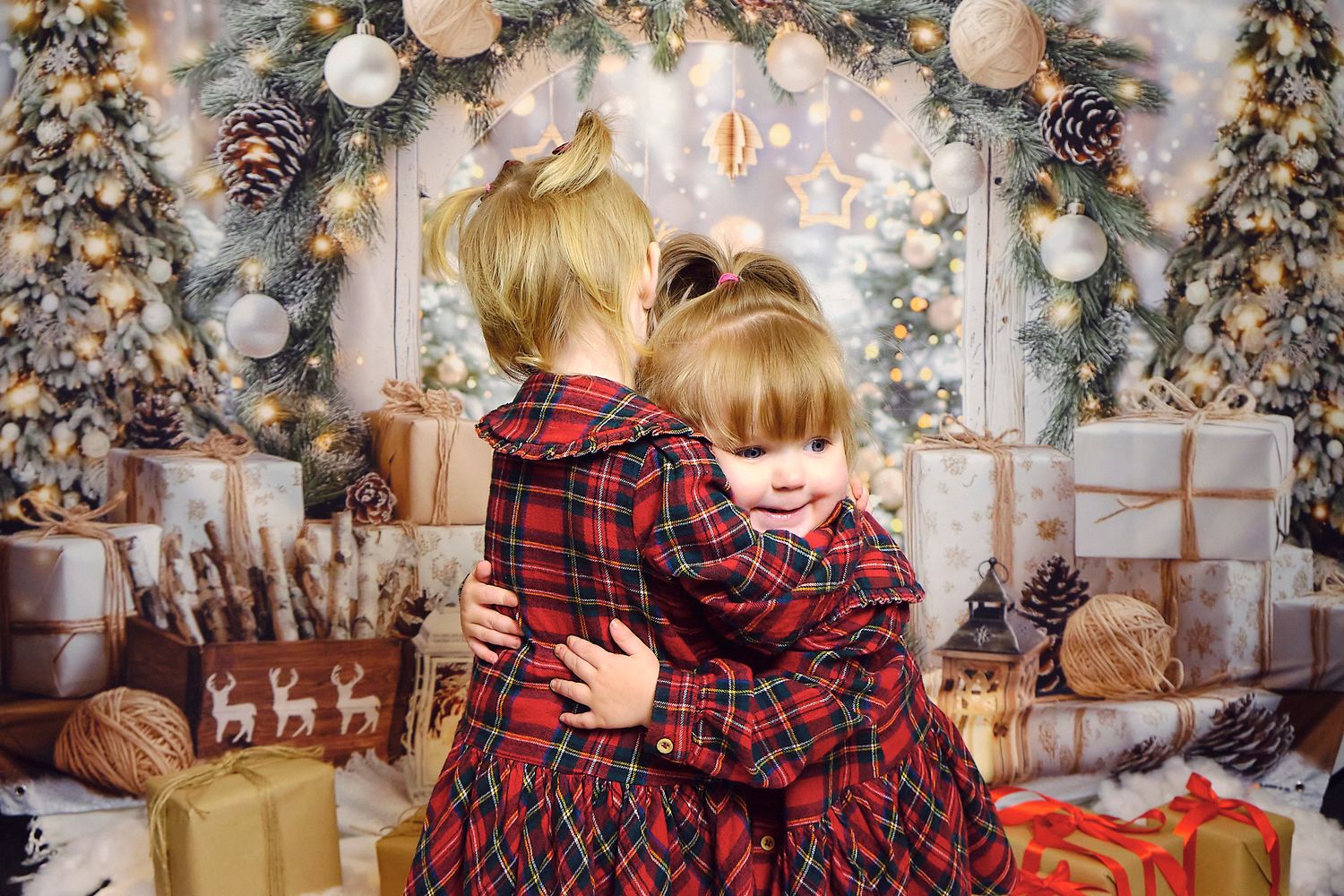 Sibling Christmas photos. siblings together with Christmas theme background.