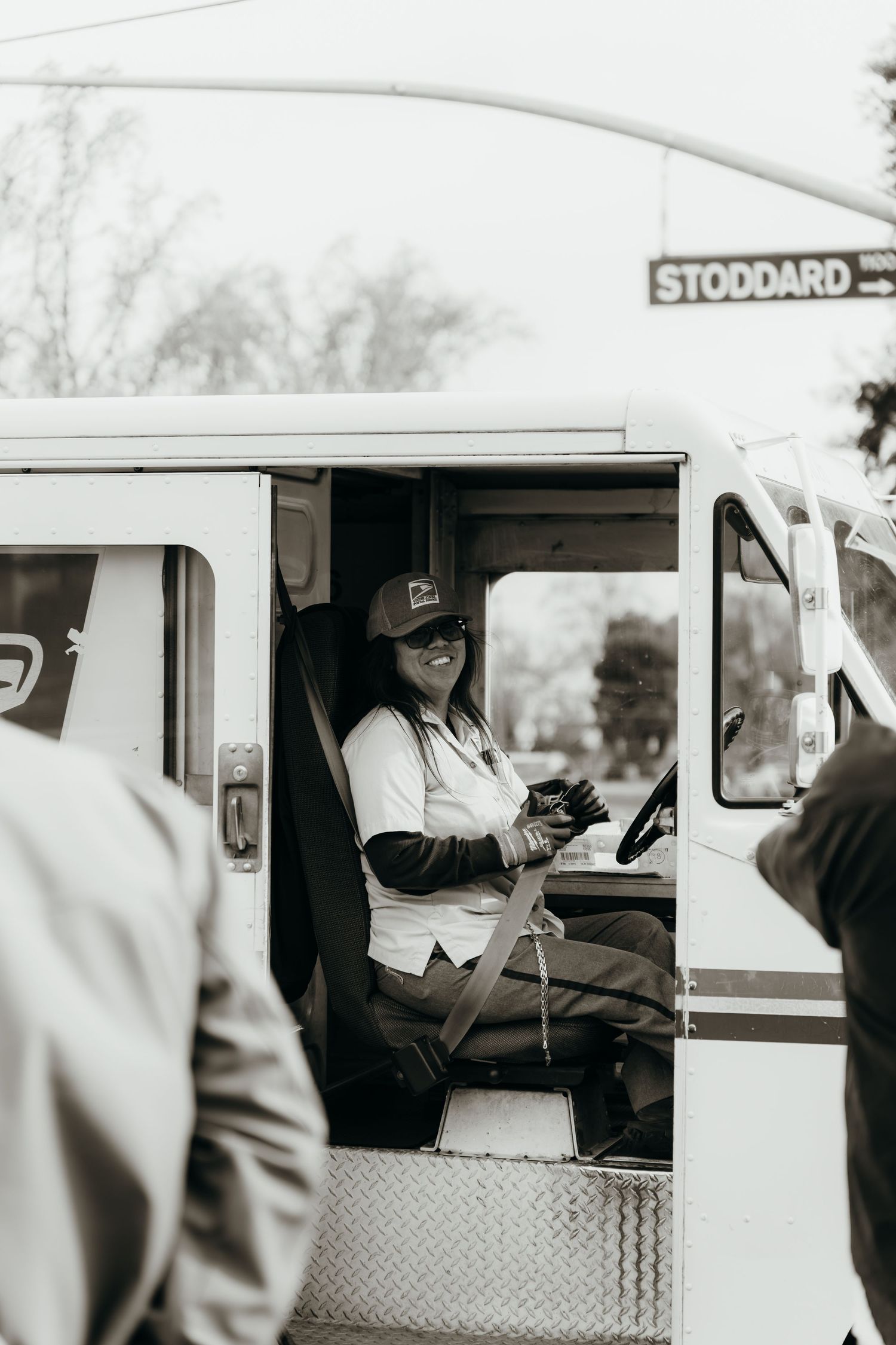 Delivery worker sitting in UPS truck on Stoddard Street.