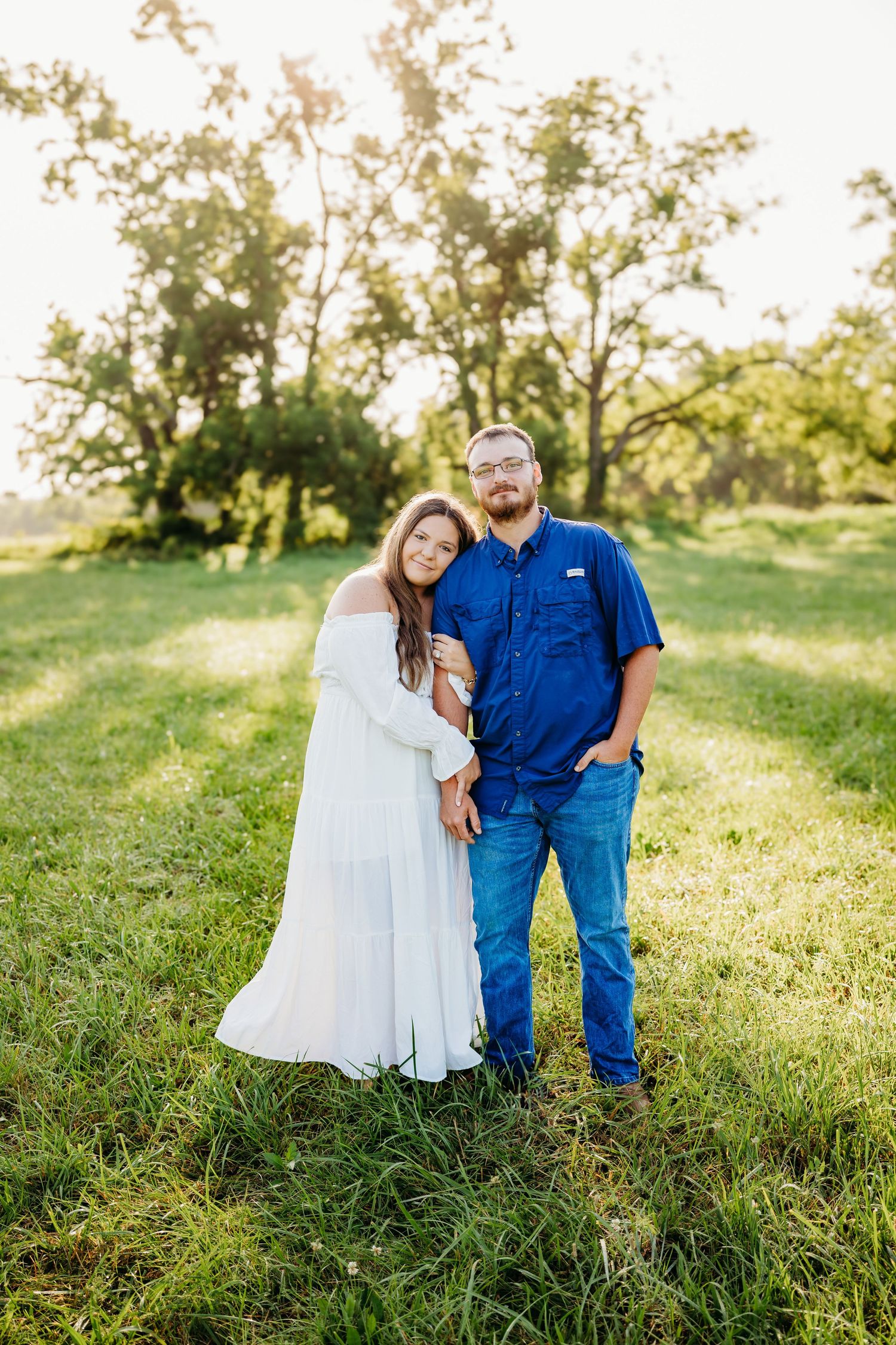 maternity session at a field in Rogers arkansas by the best maternity and motherhood photographer in northwest arkansas.