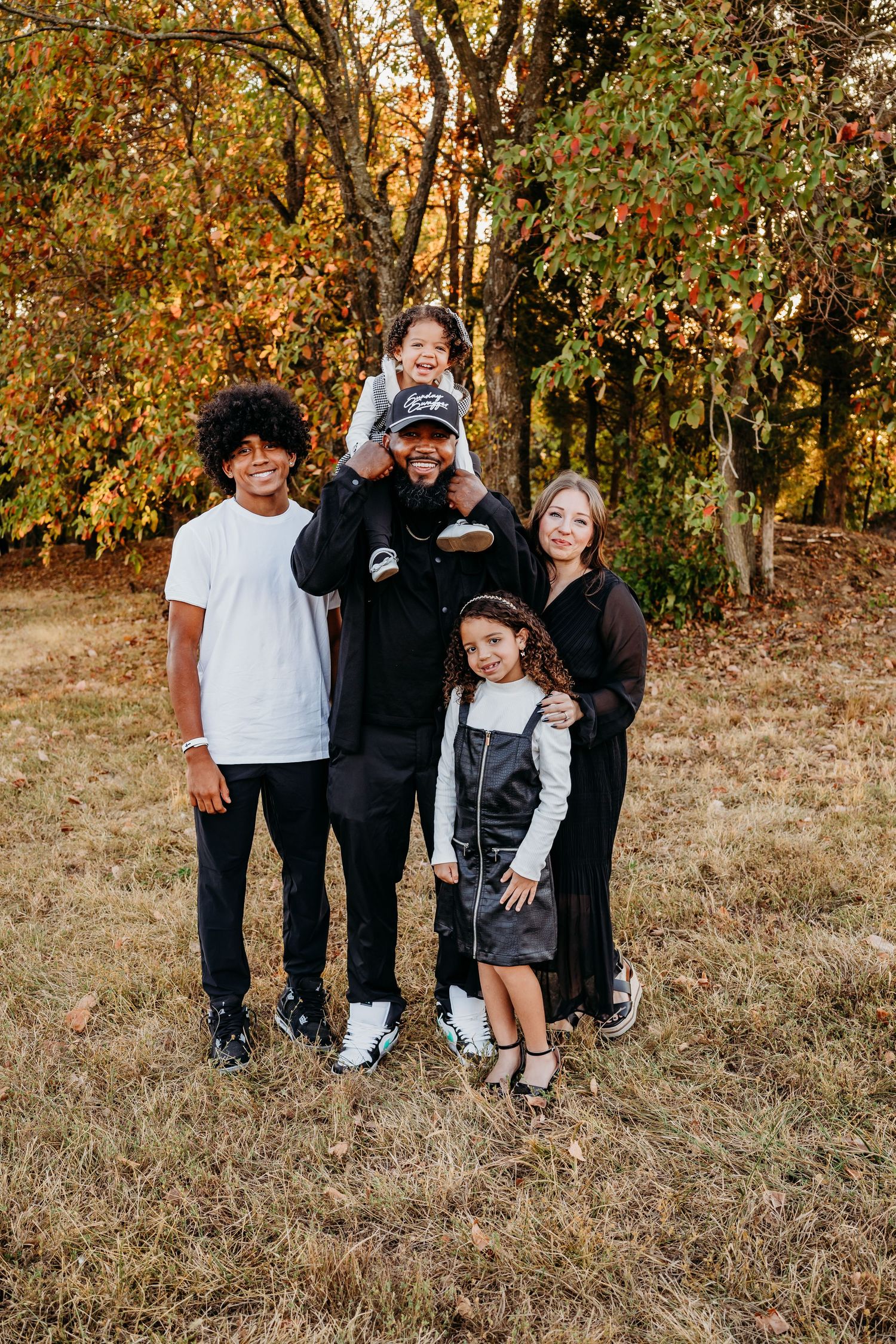 beautiful family session at Blue Hole Creek in Bentonville Arkansas by best photographer in bentonville. Extended Family Session.