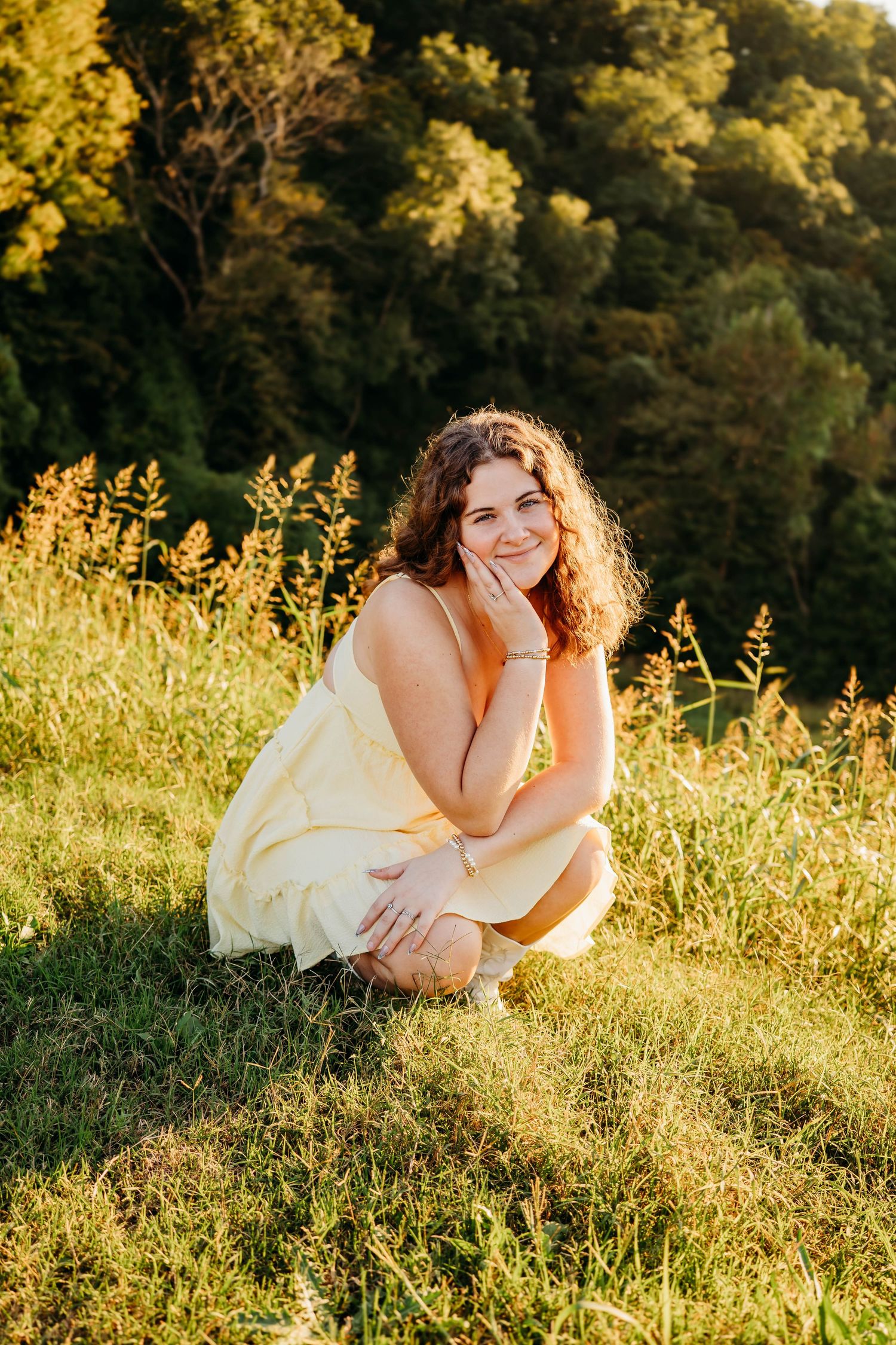 senior photography session at a beautiful Golden Hill in Bella Vista Arkansas by the best Photographer in Northwest Arkansas during golden
