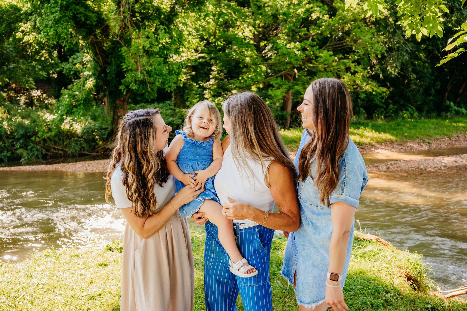 beautiful family session at Blue Hole Creek in Bentonville Arkansas by best photographer in bentonville. Extended Family Session.