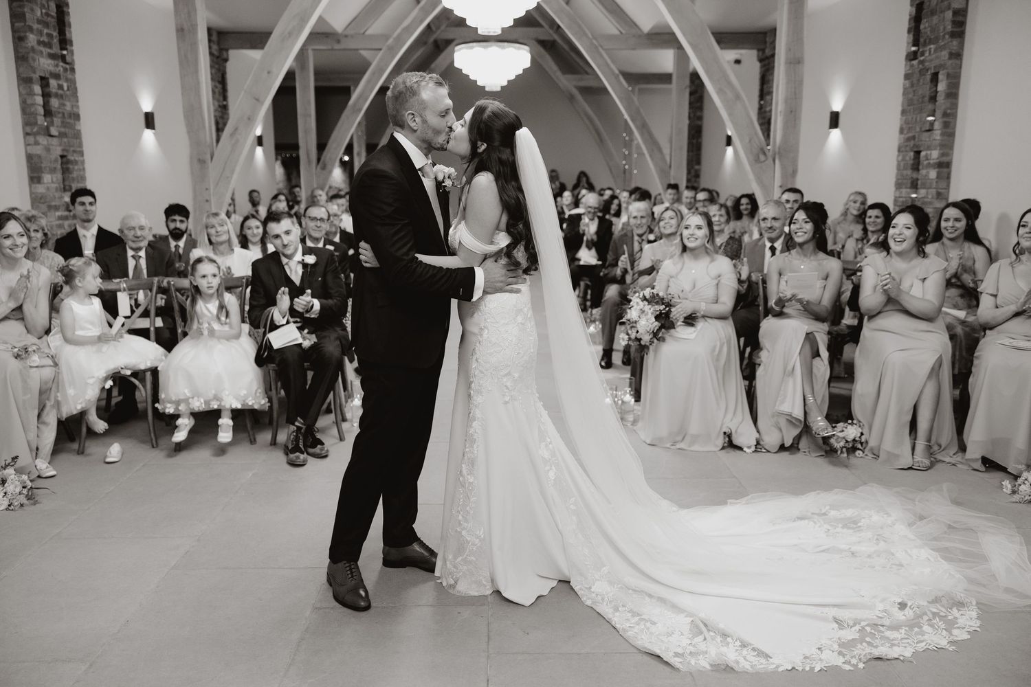A series of wedding reception dance floor moments showing couples dancing and guests celebrating at an elegant venue.