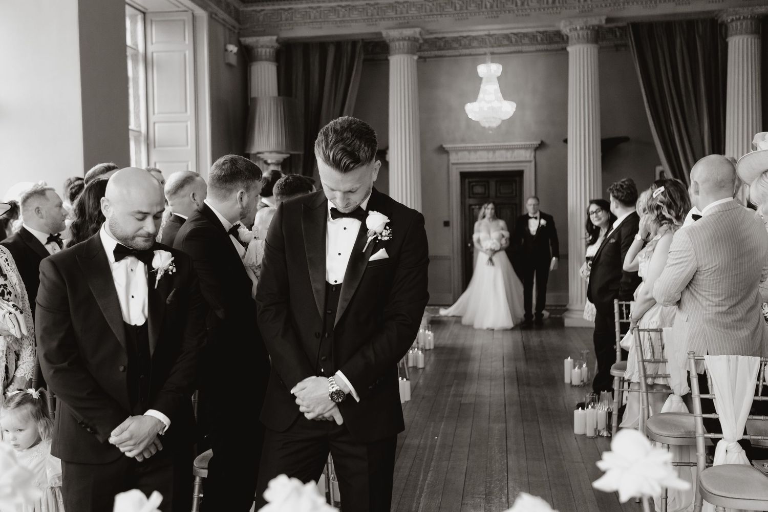 Black and white wedding photography timeline showing emotional moments during ceremony and reception.