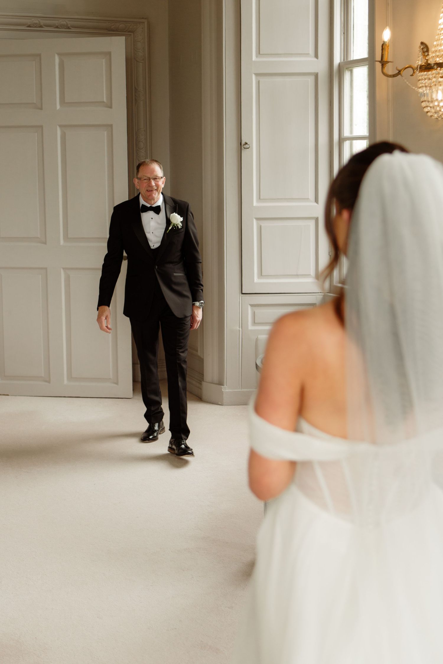 A sequence of wedding photos showing someone in a black suit rushing towards someone in a white wedding dress.
