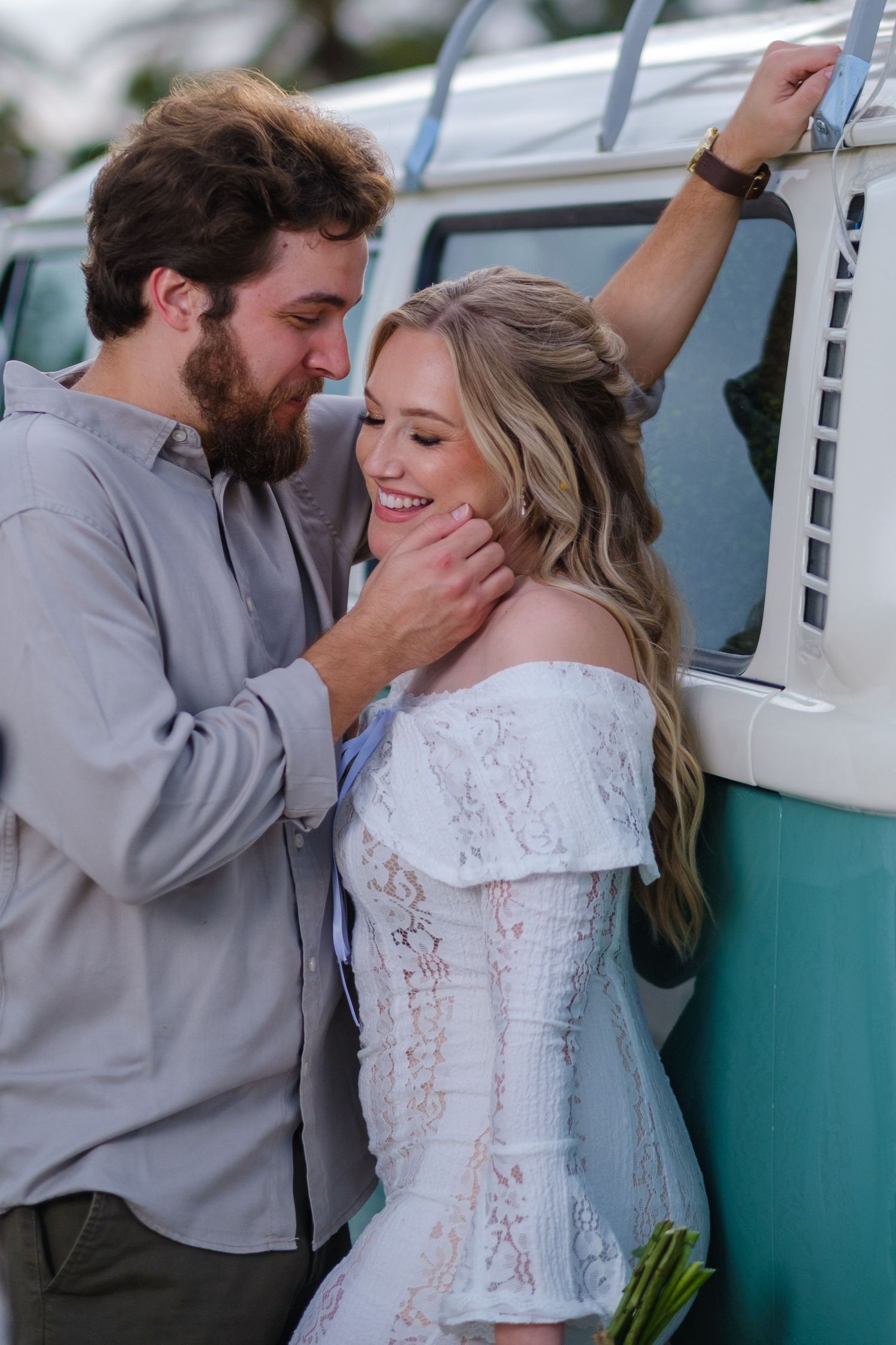 A romantic sequence of four photos showing a couple embracing against a turquoise wall in wedding attire.