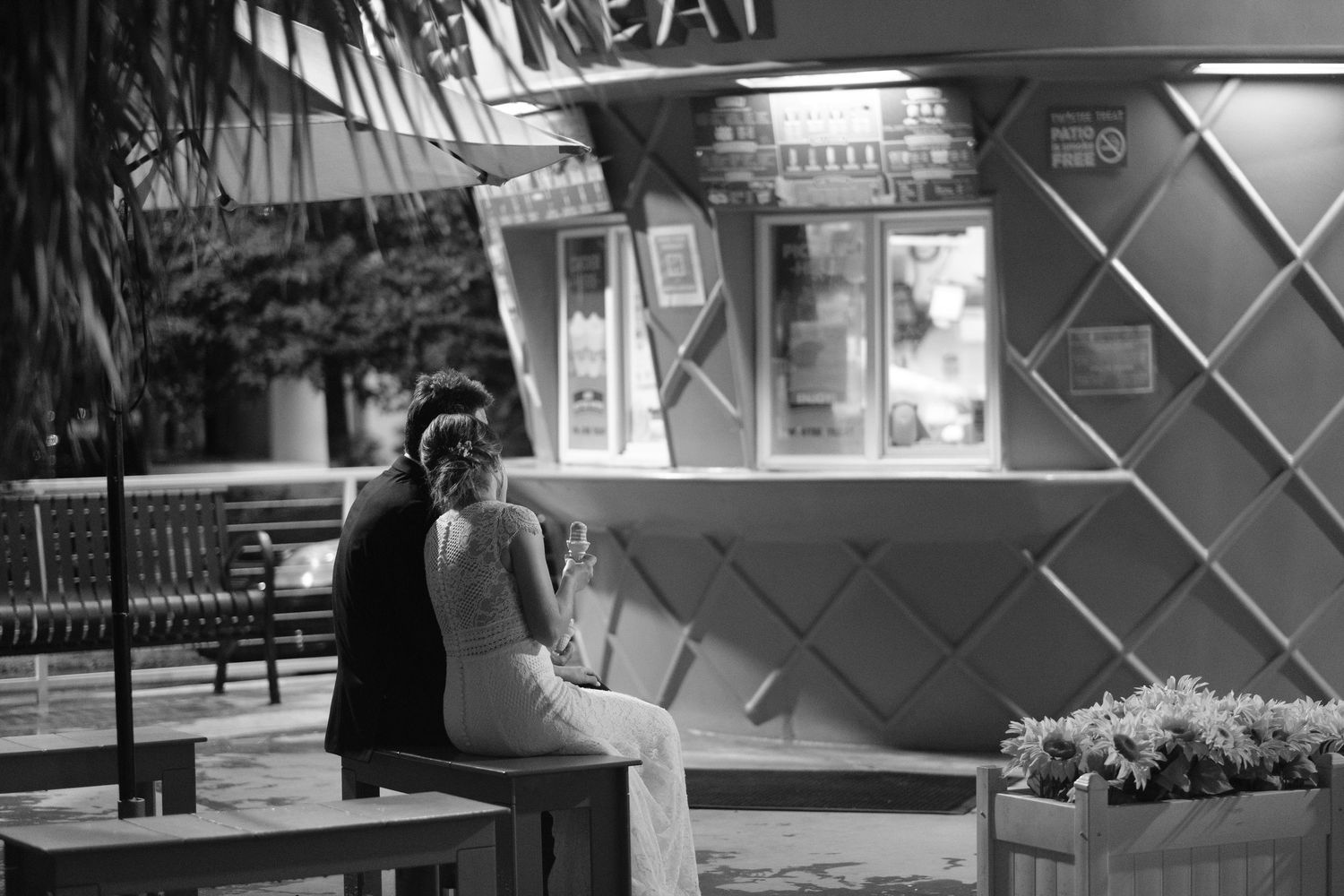 A collection of black and white surveillance camera footage showing various angles of a public space or building interior.