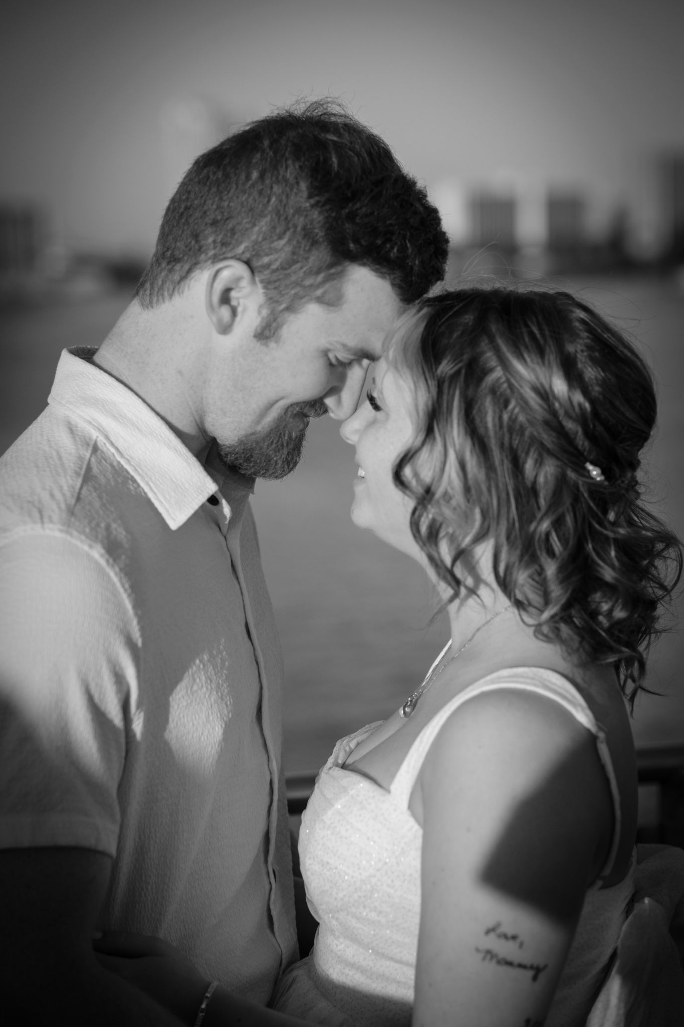 A series of romantic black and white photos showing a couple in an intimate moment during their wedding day.