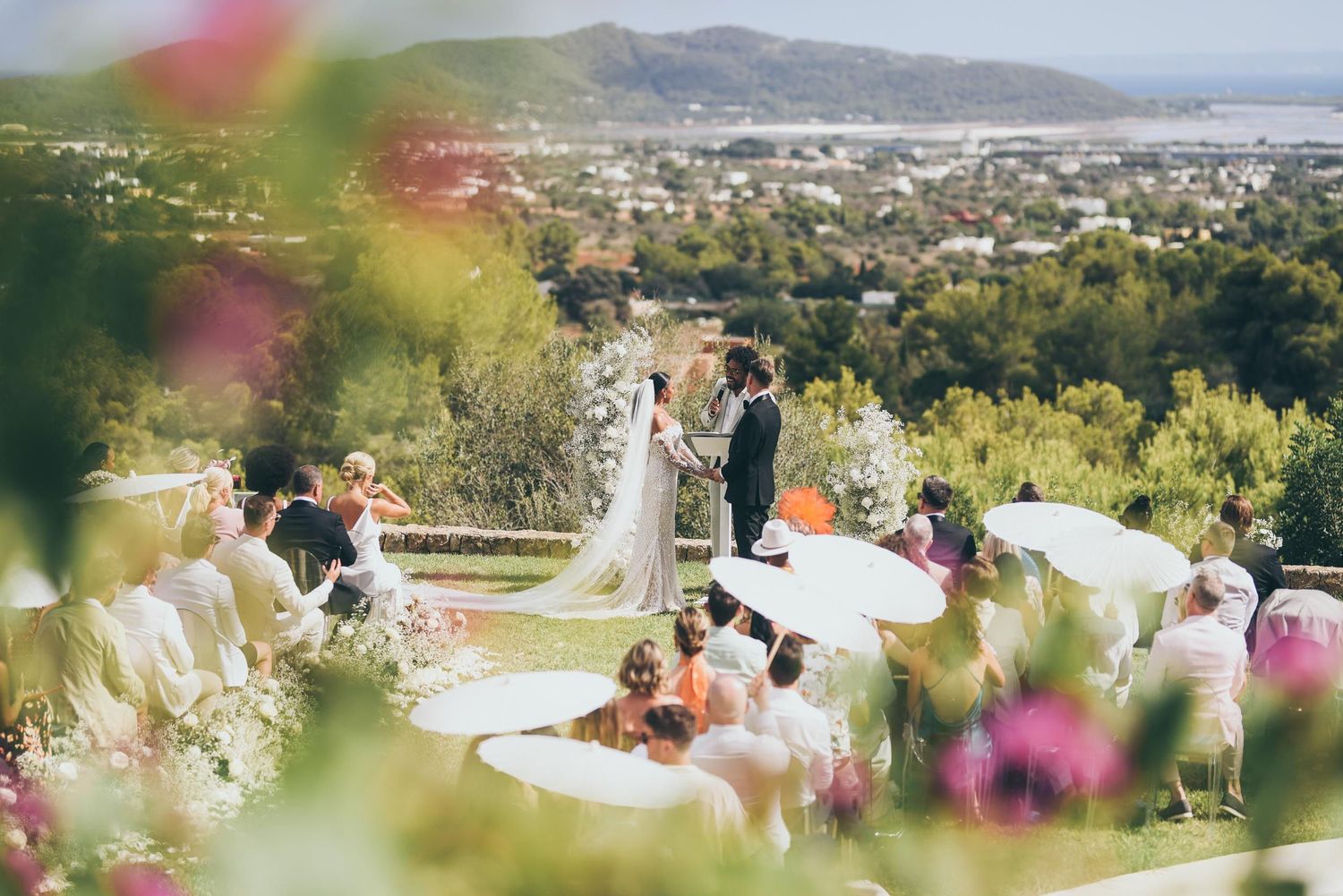 Bride and groom during their ceremony at Villa Blue Star, a luxury wedding venue in Ibiza by wedding Photographer Andrei Oprescu.