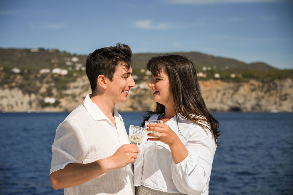 Celebration after a surprise proposal on a catamaran in Ibiza.