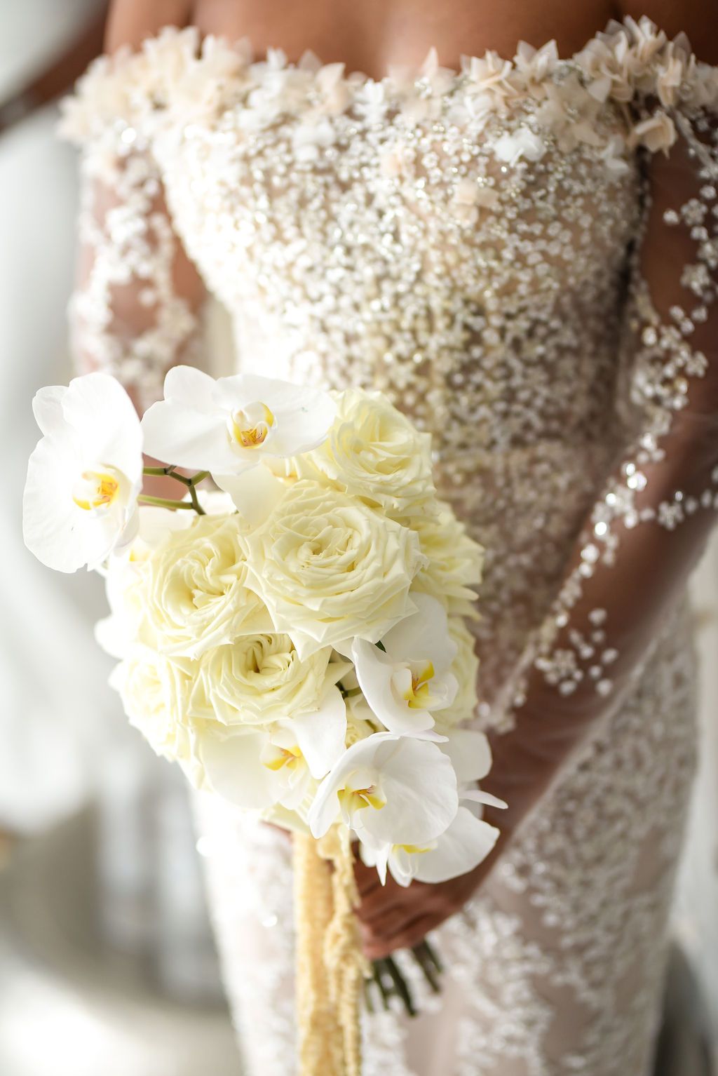 Ibiza Wedding photographer Andrei Oprescu, close up of bride's dress and flowers bouquet