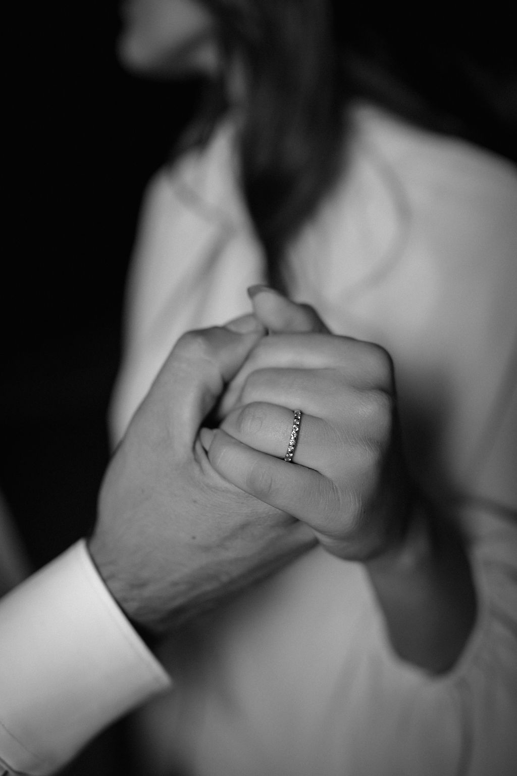 Black and white close-up of engagement ring at sunset in Ibiza