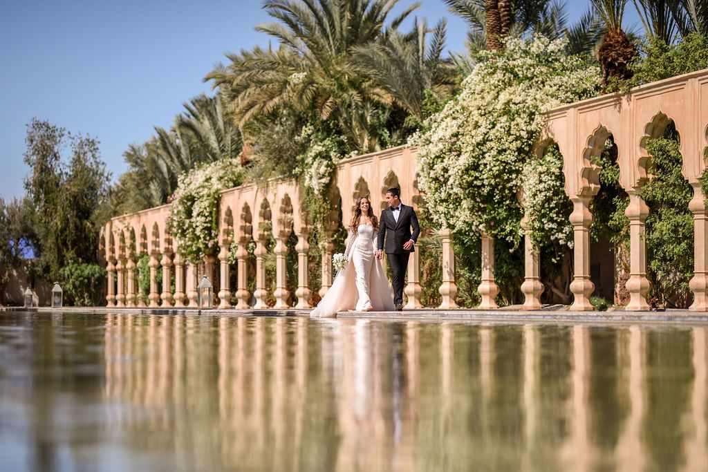 Bride and groom portraits at their wedding at Palais Namaskar in Marrakesh.