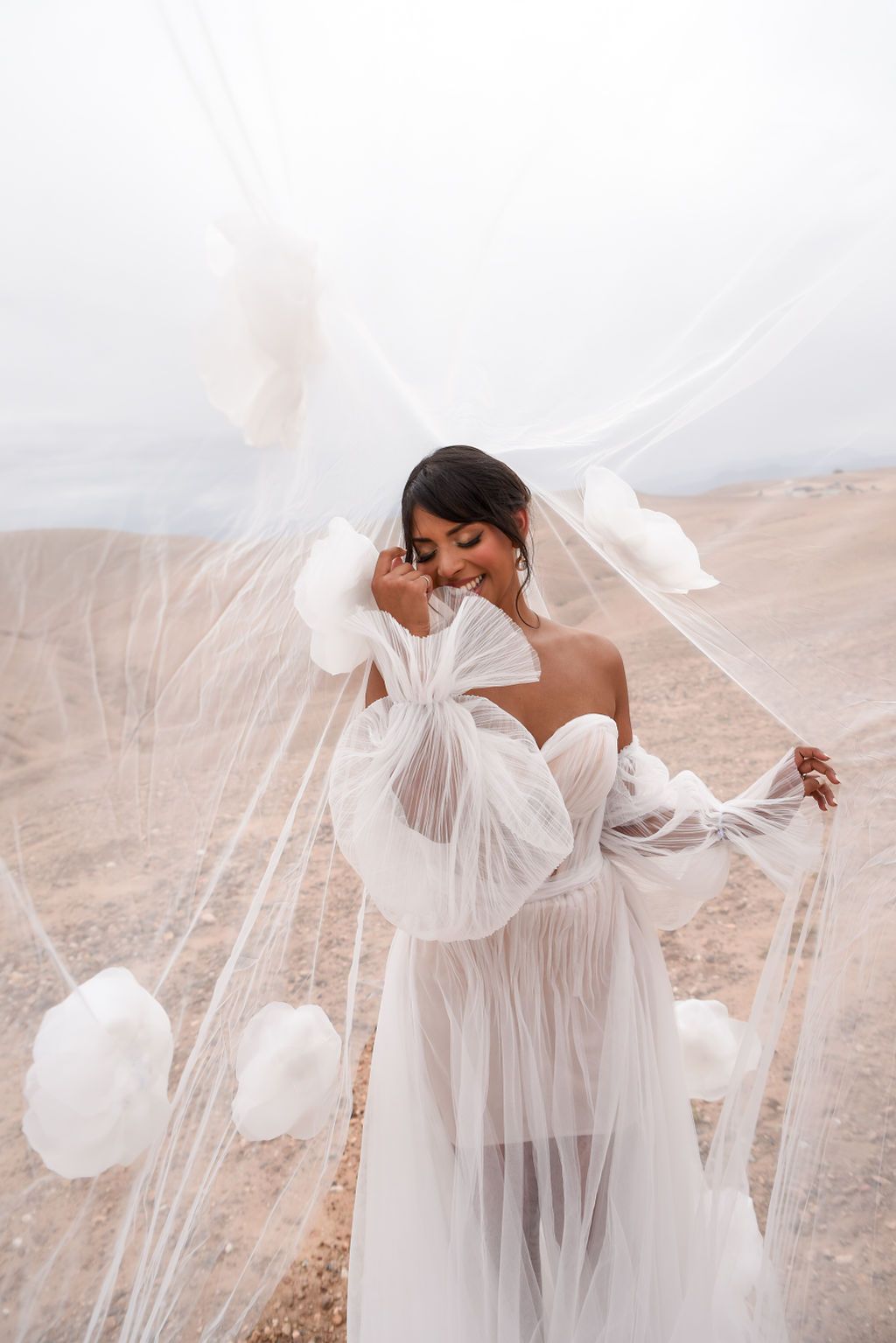 Romantic bride portraits at Alkamar Camp, Morocco.