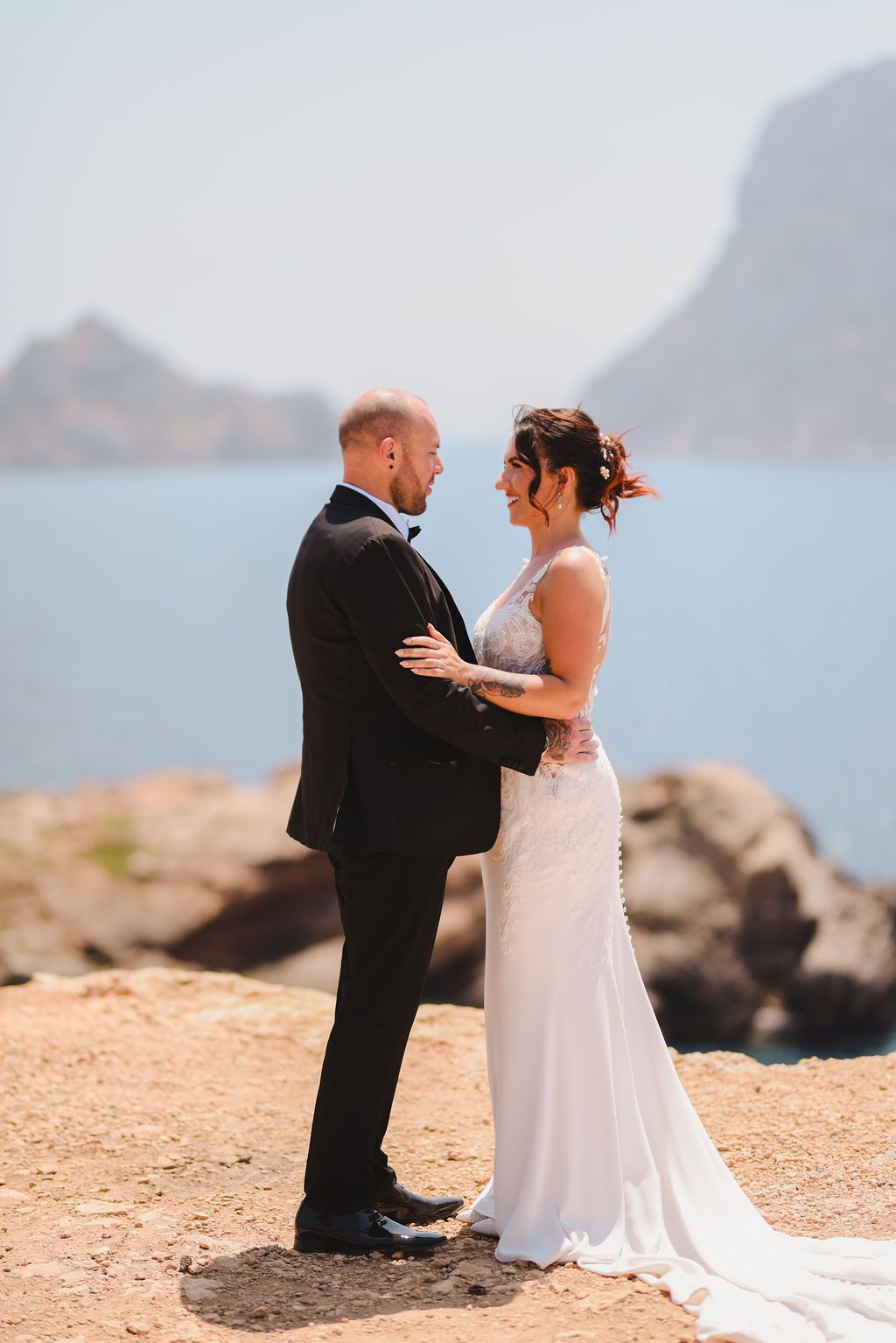 Bride and groom portraits during an elopement at Es Vedrà in Ibiza.
