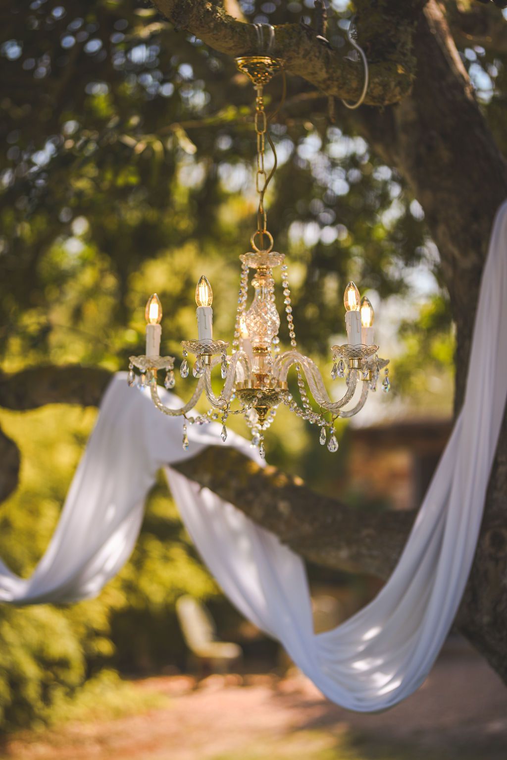 Chandelier detail capturing the atmosphere of a modern Ibiza wedding