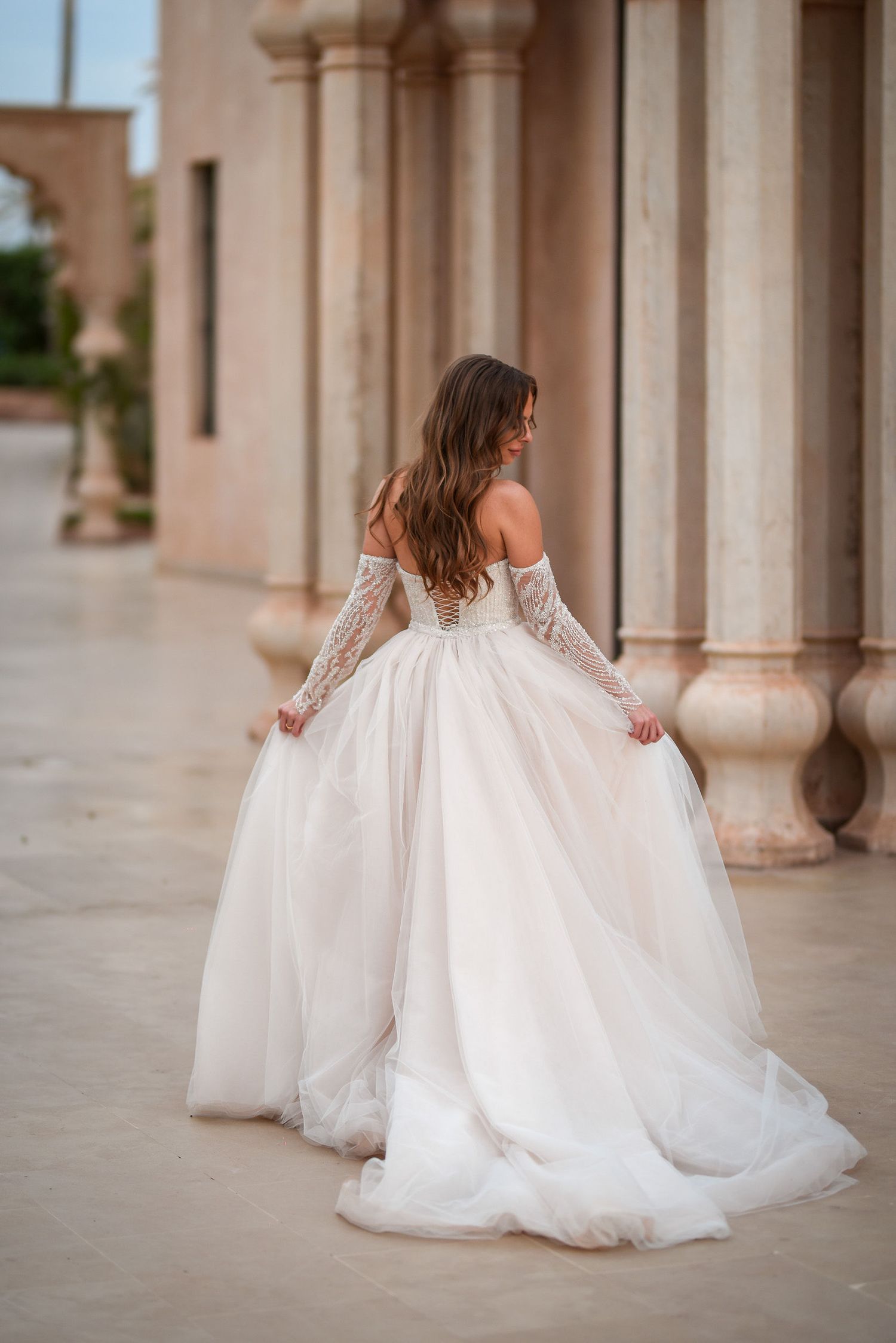 Bride in a wedding dress at Palais Namaskar in Marrakesh by Andrei Oprescu Photographer