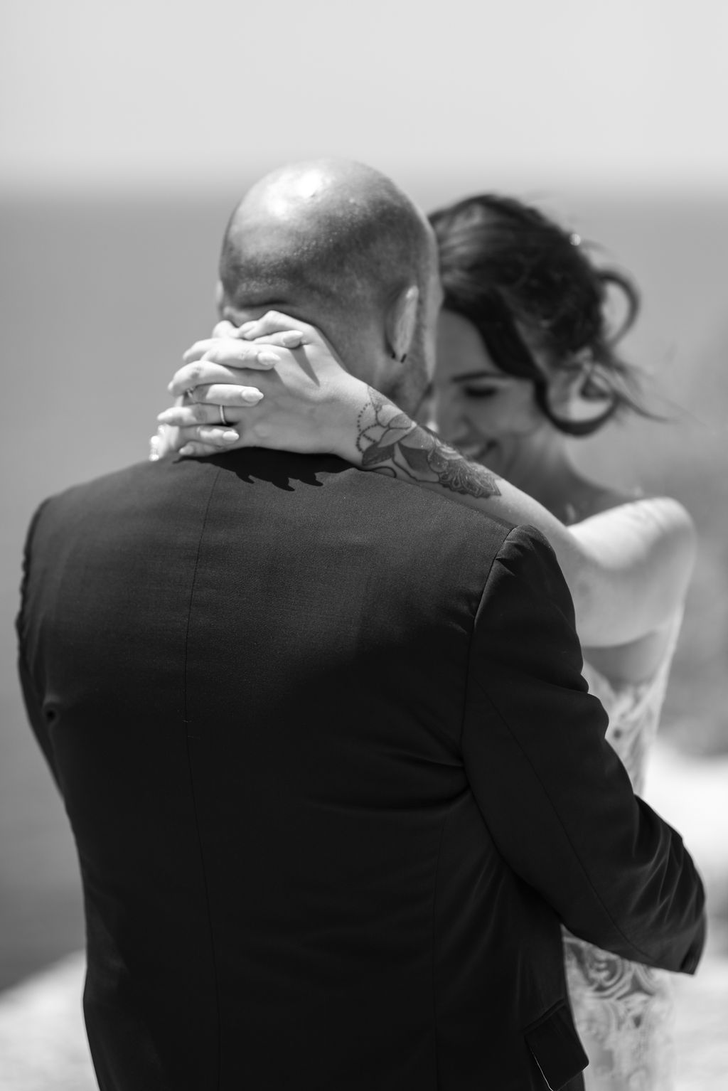 Bride and groom romantic portraits during an elopement at Es Vedrà in Ibiza.