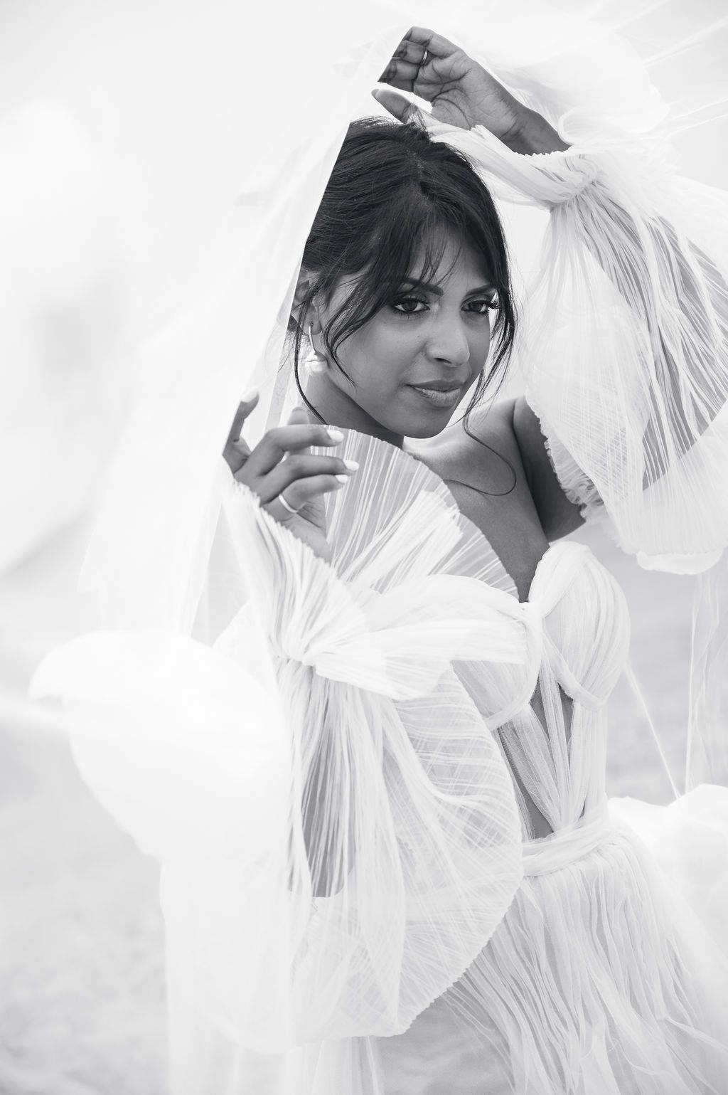 Romantic elopement portraits at Alkamar Camp, Morocco.