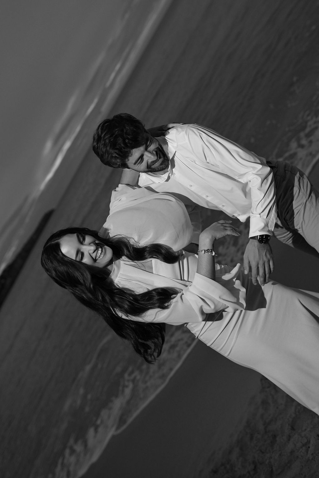 Engaged couple photographed in Ibiza during a romantic engagement session.