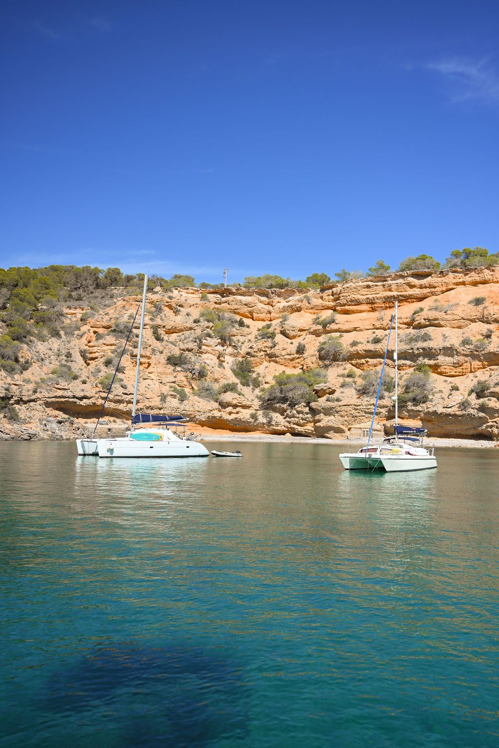ibiza landscape with boats and blue water