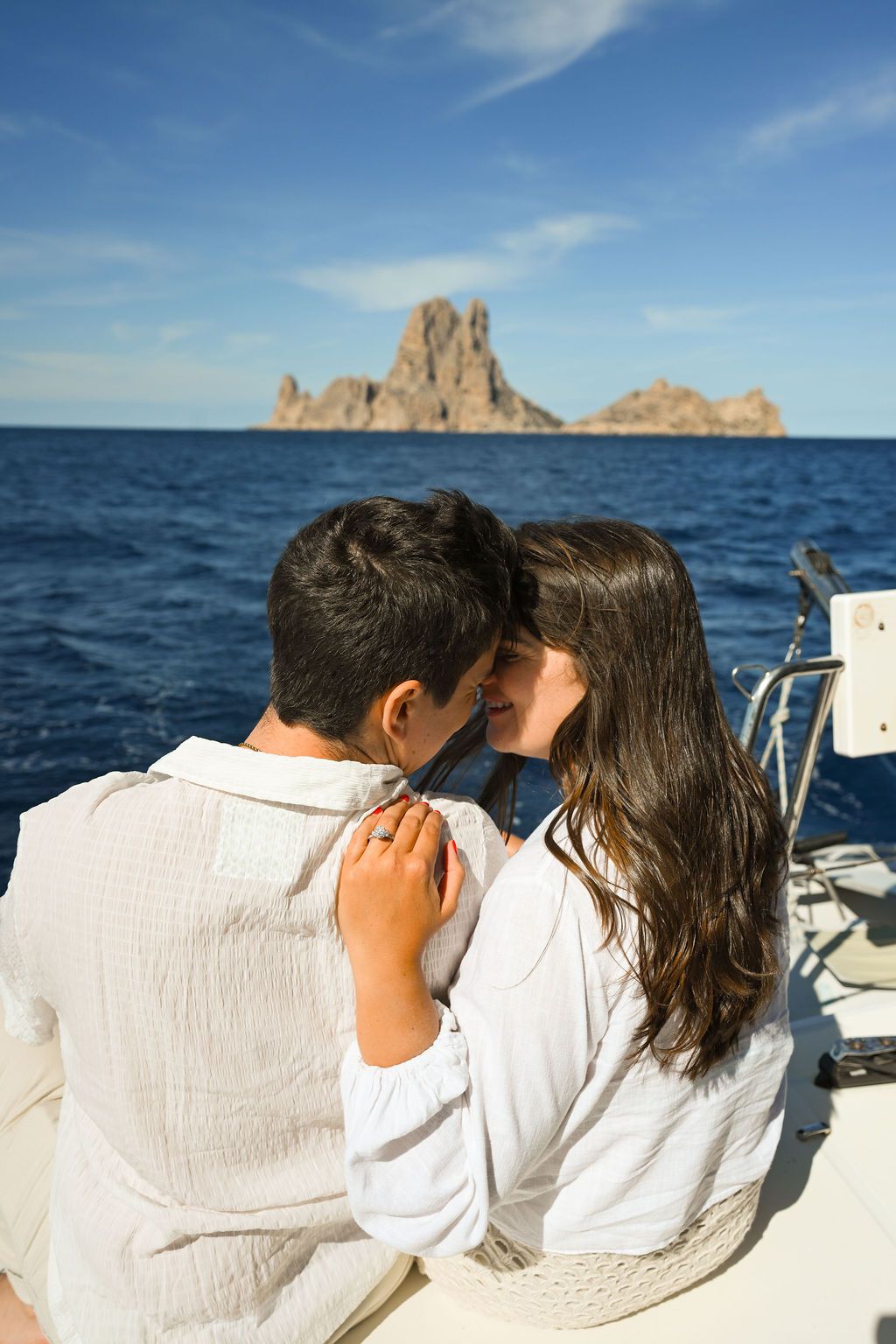 Engaged couple portrait after a proposal on a catamaran